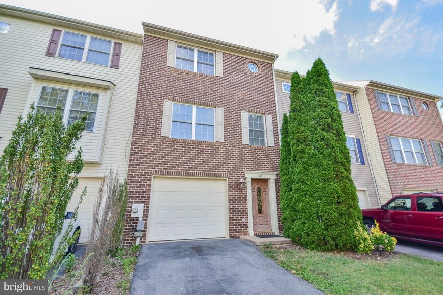 3 level townhouse featuring 3 bedrooms, 2.5 baths and a 1 car garage in the desired Spring Mills area. The kitchen has enough room for an eat-in table and the open concept dining room/living room combo makes for a spacious feel. The sliding doors open to a wooden deck overlooking the backyard. The owners bedroom features a walk-in closet and full bath. On the walk in level is an additional multi-purpose room that could be used for a family room, play room or office space. Parking includes a 1 car garage and a paved driveway to fit 2 additional cars. Located close to the Spring Mills School Complex, retail stores and restaurants with easy access to I-81. No Pets. Renters Insurance required.  Renter responsible for all utilities and trash pickup.