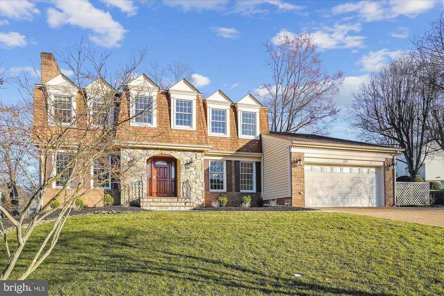 Welcome to this elegant home nestled in the sought-after neighborhood of Balmoral, boasting timeless appeal and modern updates throughout. Meticulously maintained by the same owner for over four decades, this residence radiates warmth and pride of ownership at every turn. As you step through the front door, you are greeted by a welcoming foyer that immediately feels like home. The kitchen has been thoughtfully updated with contemporary finishes while preserving its classic charm. Designed by Lois Kennedy of Portfolio Kitchens with function and style in mind. With a double wall oven, gas cook top, sub-zero refrigerator, under-cabinet lighting and Butler’s pantry, this kitchen is sure to inspire your inner chef. The breakfast area is flooded with natural light from the double windows and is framed by the work-space desk with file cabinet drawers and accent shelving. A wet bar, which transitions into the family room, completes this beautiful space which is perfect for entertaining. 
The family room boasts a brick hearth and gas fireplace flanked by shelves and mantle. Walk through the French doors leading to the flagstone patio, an exceptional space for a morning coffee or evening glass of wine. The large laundry room is tucked away and includes a second refrigerator with an icemaker and large storage closet. The formal dining room is open and bright with great natural light and custom molding, perfect space to gather with family and friends for those special occasions. The living room is accented by a beautiful fireplace with marble hearth and surround. Just through the living room is your personal sanctuary - a home office designed to inspire productivity and creativity, while offering serene views of the lush backyard that soothe the soul. The custom cabinets and bookshelves make it the perfect place to work-from-home. 
At the top of the staircase is the primary bedroom, a spacious retreat with two generous walk-in closets offering plenty of room to store your wardrobe and accessories. The primary bathroom features a lavish soaking tub, a separate walk-in shower with custom tile and seat, and a dual-sink, comfort-height vanity which provides ample space for pampering. The three additional bedrooms are spacious and bright with large closets and are serviced by the updated hall bathroom with dual-sink vanity. 
The centerpiece of the lower level is a large recreation room with wood-burning fireplace, ideal for a children’s playroom, billiard room or home theatre; the possibilities are endless. With a roughed-in bathroom, a bonus room and large storage area the lower level offers flexibility and function. New carpet on the top two levels and fresh paint in nearly every room makes this property turn-key.
Balmoral neighborhood offers a community trail connecting to the W&OD trail, a leisurely stroll to Vienna’s historic Church Street or an extended bike ride to Leesburg or Old Town Alexandria. Conveniently located near shopping, dining, parks, and top-rated schools, this home offers the perfect blend of comfort, convenience, and charm. Don't miss your chance to own this lovingly maintained gem – schedule your showing today and experience the timeless beauty of this classic home for yourself!