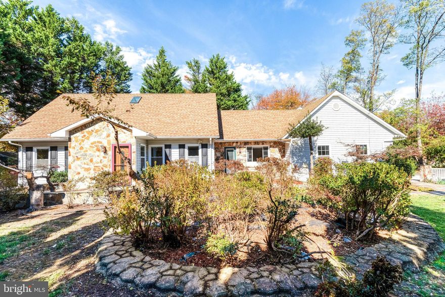 Perfectly situated on a desirable corner lot, this stunning 6 bedroom, 4.5 bath home was completely transformed through a full-scale renovation and expansion in 2010. The thoughtful updates include two luxurious primary suites, a spacious family room, and an oversized two-car garage addition.
Step inside to discover a bright, open layout enhanced by solid hardwood floors, abundant natural light, and a seamless flow throughout. The light-filled main level features three bedrooms, a sunlit living room overlooking the professionally landscaped, fenced front yard, and a chef’s kitchen that serves as the heart of the home. Boasting granite countertops, stainless steel appliances, and sleek custom cabinetry, center island, and a build in microwave, the kitchen is perfect for both everyday living and stylish entertaining.
A convenient side door near the laundry room provides easy access to the ground-level patio, complete with a fire pit—ideal for family gatherings and outdoor enjoyment. Upstairs, you’ll find the  second primary suite, two additional bedrooms, and a full hall bath.Freshly painted throughout, the home offers ample storage space and an unfinished bonus room above the garage, providing endless potential for customization. The oversized two-car garage and paved driveway accommodate parking for six or more additional vehicles.
Outside, the beautifully landscaped garden blooms with vibrant flowers throughout the seasons. With no HOA, and a prime location just minutes from the Vienna Metro (Orange Line) and Tysons Corner, this home perfectly blends modern luxury, convenience, and community—all within the highly sought-after Oakton High School pyramid.