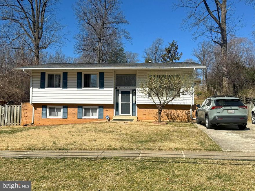 Welcome to this charming 5 Bed/2 Bath split foyer home in superb & desirable location located on a quiet street in the highly sought-after BEL PRE WOODS in Rockville! This charming home offers incredible value with an open living and dining area filled with natural light from large windows but with landscaping providing privacy. New Windows (2023), Hardwood Floor Throughout the home and the kitchen, with space for a table, offers a stunning view of the backyard. The full, open basement, complete with a side walk-out to the lush backyard, includes a 2 bedroom with window and full bath, making it perfect for guests or entertaining.  Lower-level laundry and utility room with storage provides plenty of space to store items or start a hobby. Very close to elementary and middle schools, 1 mile from Aspen Hill shopping centers, 1.8 miles from Bauer shopping center/Rec center, 2.5 miles from Leisure World shopping center. Step into the open concept living/dining area on the top floor, featuring hardwood floors and beautiful, natural lighting throughout.  Primary bedroom and 2 additional true-sized bedrooms on the top level share a full-size bath. With a little imagination, this home will shine brightly, Large fenced in backyard, perfect for backyard BBQ’s or family/friends get togethers, Priced to sell, this opportunity won't last long—schedule your showing today!