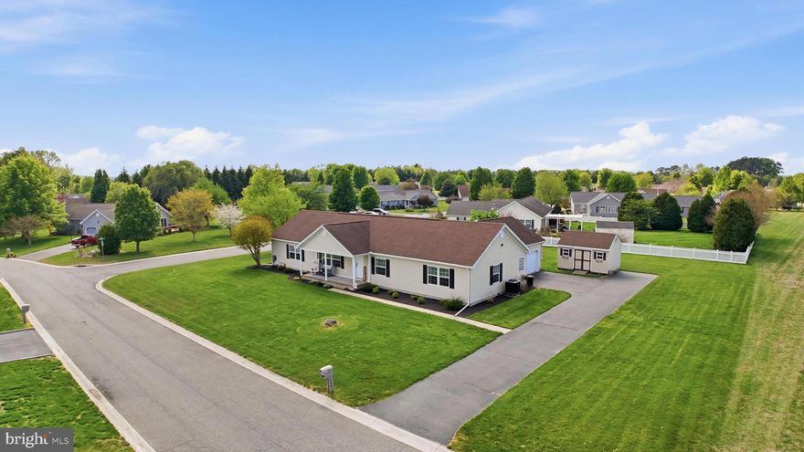 It’s a rare pleasure to present a home that has been so thoughtfully maintained and meticulously cared for, with pride of ownership evident in every detail. Situated on over half an acre in a highly desirable neighborhood of Wynn Wood within the award-winning Caesar Rodney School District. This property offers expansive front, side, and backyard space, including a partially fenced yard and a raised deck complete with lighting and speakers—perfect for relaxing or entertaining. Inside, just over 2,000 square feet feels even more spacious thanks to abundant natural light, an open yet functional layout, and luxury vinyl plank flooring throughout. The kitchen features a natural gas cooktop, endless countertop and cabinet space, and flows seamlessly through a convenient breezeway and laundry area, creating an ideal mudroom setup from the oversized garage. The primary suite is a true standout, offering a flexible sitting area or office space, a large walk-in closet, and a beautifully appointed ensuite bath with double vanity and tiled shower. Two additional bedrooms each include generously sized walk-in closets and share a full bath with a tub-shower combo. With an electric powered shed, lush carefully maintained lawn, and a quiet, well-established setting, this home offers comfort, functionality, and a lifestyle you’ll be proud to call your own.