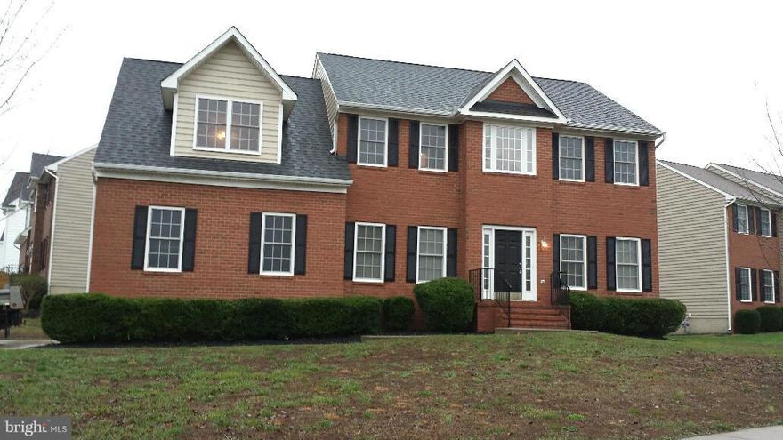 SPACIOUS COLONIAL ON A CORNER LOT - BRICK FRONT, UNFINISHED BASEMENT, SIDE LOAD GARAGE, CONCRETE DRIVEWAY, WALKING TRAILS, COMMUNITY POOL, AND MUCH MORE!