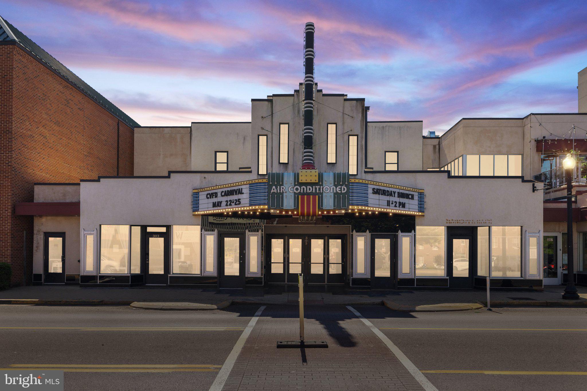 303, 305, 307 S. MAIN ST AND 115 E. LOCUST STREET