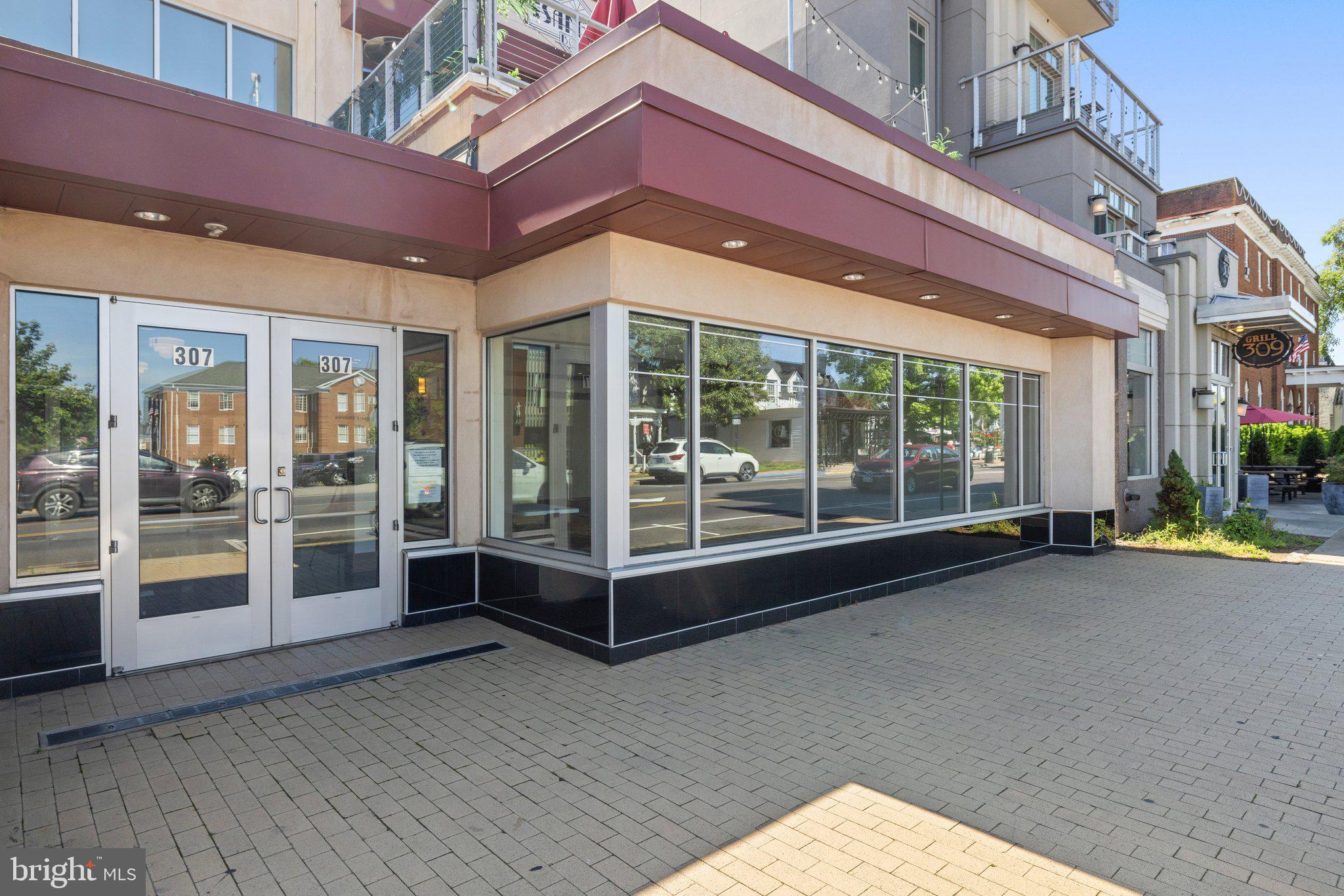 303, 305, 307 S. MAIN ST AND 115 E. LOCUST STREET