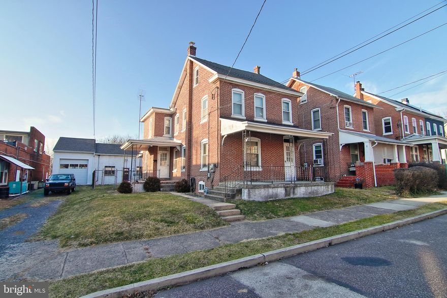 A piece of West Pottsgrove history is now available. 5 bay auto repair garage with 2 single family detached homes all situated on 2 parcels. This unique property can include the auto repair garage business, all equipment and book of clients. TOTALLY TURN KEY! The business and real estate can also be sold separately. The garage sits in the rear of the homes and offers 5 bays with 4 auto lifts (1 above ground and 3 in-ground), restroom and office. There are two heaters for the garage, a standard oil heater and a waste oil heater. There are NO underground tanks.  ALL equipment including tire/wheel balancer, tire changer, inspection/emission machine, pipe bender, lathe, tanks and ALL tools are included with the sale. You could open up shop on day one. Garage has a brand new roof just installed. In front of the garage you will find 2 single family dwellings. One is currently tenant occupied and the other (larger) home is vacant. Perfect for an at home business! 411 E Vine St features a covered front, side and large rear porch. Inside the home, the first floor has an eat-in-kitchen, dining area and extra large living room on the first floor. The second floor has 3 bedrooms, full bath and walk-in-closet. The attic is unfinished and can be used for storage or easily finished into a forth bedroom. In the basement there is a second full bath. Verizon Fios provides fast internet service. This home has a newer roof, replacement windows, newer gas heater, newer stainless chimney liner, electric water heater and 100amp electric. 415 E Vine St offers a kitchen, dining room, living room, laundry room and enclosed side porch on the first floor. Second floor has 3 bedrooms and a small full bath. This home has a newer heater, newer oil tank, replacement windows, electric water heater and 100amp electric. 415 E Vine St is currently tenant occupied. This unique property is a once in a lifetime opportunity for a lucky buyer. These properties are being sold as-is. West Pottsgrove property transfer inspection and any required repairs are the responsibility of the buyer.