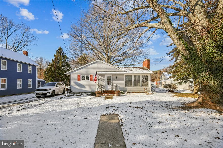 Welcome to this charming 3-bedroom rancher in the quaint town of Rock Hall. Featuring beautiful wood floors throughout, this cozy home is being sold as-is—perfect for buyers looking to add their own personal touch. A standout feature is the detached garage with a bathroom rough-in, currently used as an entertainment space or “man cave.” With a few updates, it could easily be transformed into a studio, home office, or “she shack,” providing flexible space to suit your lifestyle. Recent improvements include newer kitchen appliances, a new HVAC system, a 6' vinyl privacy fence, and a tankless water heater (ready for installation). The oversized garage offers generous storage and electrical service, while the spacious driveway can accommodate multiple vehicles or even a boat. Enjoy the best of year-round coastal living just a short stroll from beaches, marinas, restaurants, and the bay. Whether you prefer peaceful walks, fishing, swimming, or unforgettable sunsets, this ideal location has something for everyone. Bring your golf cart and bicycles to fully explore all this charming town has to offer. And get ready to host the ultimate Fourth of July celebration—Rock Hall’s famous Independence Day Parade and Festival march right past your home. ***Home is being sold AS-IS; Sellers will make no repairs***