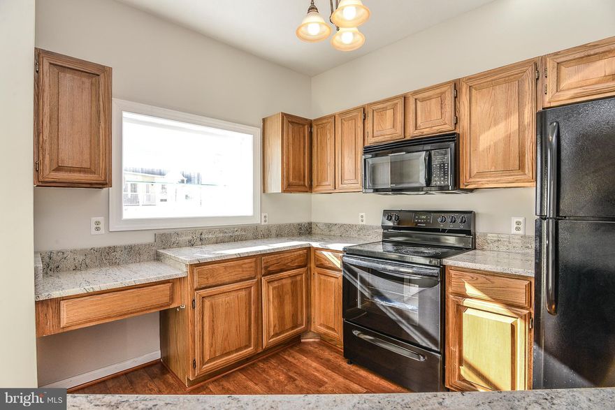 A BEAUTIFUL RECENTLY UPDATED, SPACIOUS 2BR 2FB CONDO, FEATURING ABUNDANT NATURAL LIGHT, OPEN FLOOR PLAN WITH HARDWOOD THROUGHOUT LIVING AREAS.  NEW CARPET IN BEDROOMS, NEW WINDOWS, NEW APPLIANCES, FRESH PAINT THROUGHOUT,    UPDATED MASTER BATH,  REAL WOOD-BURNING FIREPLACE, ENCLOSED PATIO, POOL ACCESS AND ASSIGNED PARKING, EASY ACCESS TO RT 7/RT 15/DULLES GREENWAY/DOWNTOWN LEESBURG.