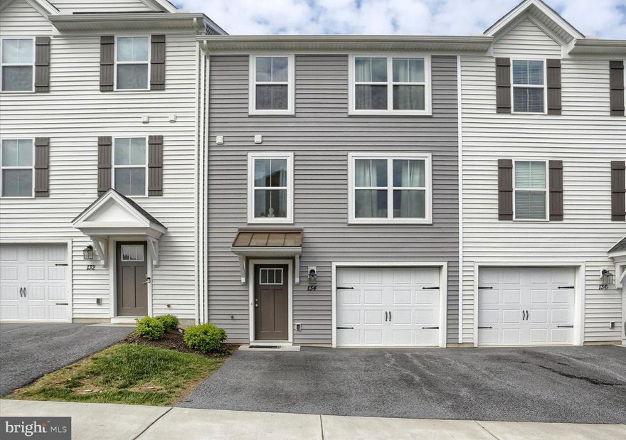 Welcome to the Creekvale community!  Enter into this well maintained home with a wide foyer that leads to the finished walk-out basement and one car garage.  Level 2 offers an open floor plan with living room, eat-in kitchen with granite counter tops, stainless appliances, pantry and kitchen island which includes the dishwasher and large sink.  Kitchen table, chairs and matching cabinet remain with the home.  Walk out of the kitchen onto the deck to relax and enjoy some grilling.  Level 3 includes 3 bedrooms, laundry(washer and dryer included), hall bathroom with tub/shower combo.  Primary bedroom has a walk-in closet and bath with dual sinks, a walk-in shower and linen closet.  Don't miss seeing this home, schedule a tour today!