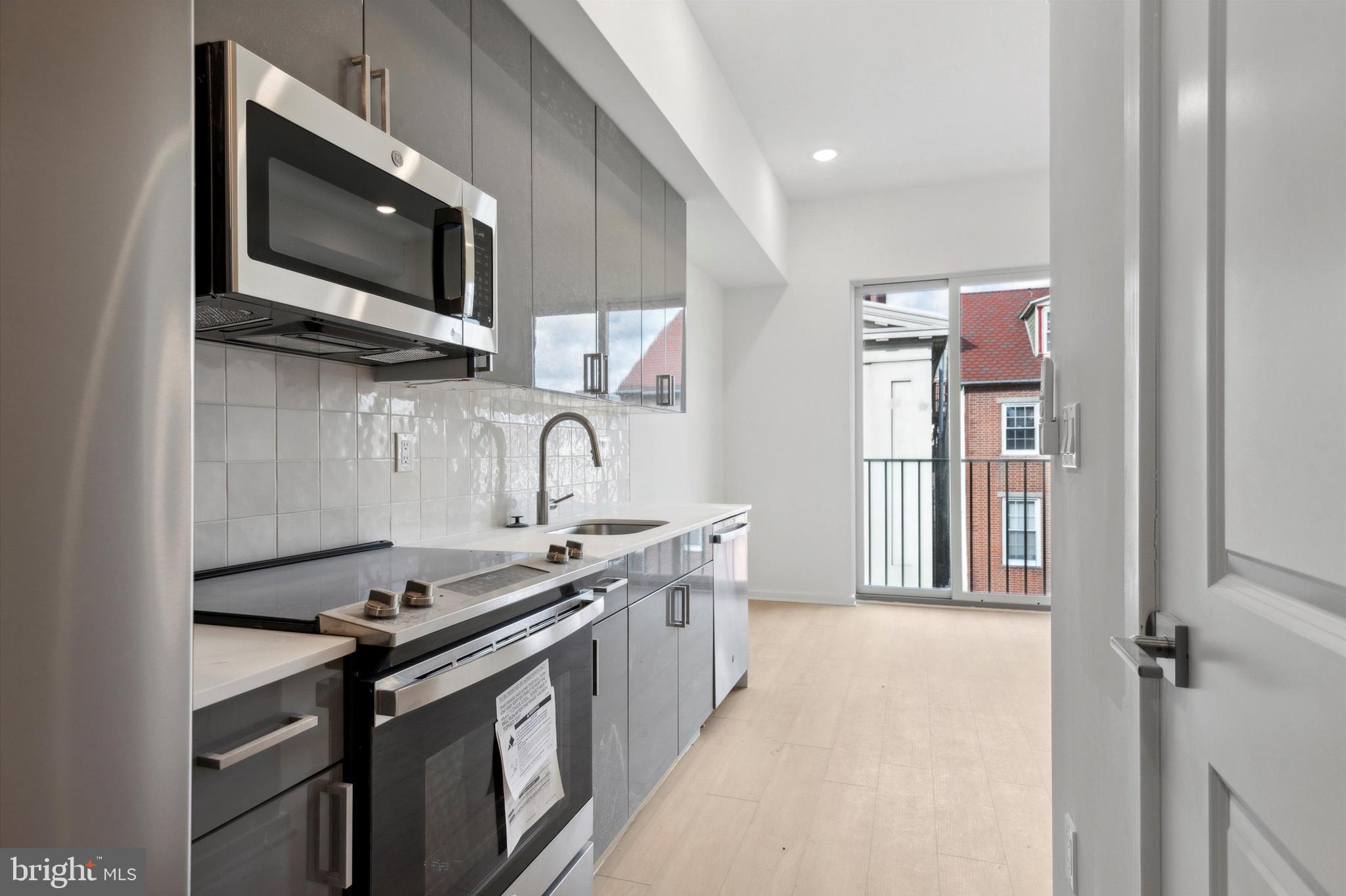 Welcome to the Vine on 12th, the epitome of luxury living in the heart of vibrant Chinatown, Philadelphia. Situated just blocks away from the bustling Convention Center, iconic Reading Terminal Market, and historic City Hall, this modern urban haven invites you to fully embrace one of the city's most culturally rich neighborhoods. The community is comprised of two buildings, the boutique four story, six unit "North" building with select bi-level residences and private decks and the "South" building featuring nineteen elevator served residences with shared roof deck. Our exquisite studio, one and two-bedroom layouts are adorned with premium finishes, including pristine, white stainless GE cafe appliances in select units. For added convenience, there's parking available at adjacent lots, professionally managed by Parkway. Immerse yourself in Chinatown's captivating charm, brimming with authentic cuisine, unique shops, and an energetic atmosphere. Don't miss the opportunity to secure your spot in this modern sanctuary, where sophistication and convenience seamlessly combine to offer a truly exceptional lifestyle experience. Your new home at the Vine on 12th awaits!
