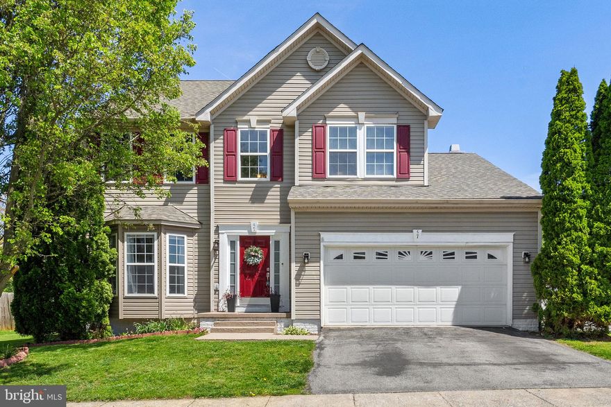 Expansive colonial in a picturesque setting boasting a bright and open floor plan! Off the family room with bay window is the elegant dining room, complete with chair rail and crown molding, ideal for hosting gatherings. For seamless entertaining, the fully updated kitchen boasts quartz countertops, a new dishwasher, a deep sink, an island with seating for four, and breakfast nook with sliding glass doors. This leads to a large, printed patio with firepit in the fenced backyard where you'll find a mature cherry tree, fragrant lavender plant, and thriving herb garden, creating a tranquil outdoor retreat. Back inside, the family room awaits with a wood-burning fireplace, perfect for cozy evenings. Carpeting is just 3 years old with waterproof pad protection and LVP is even newer. The primary bedroom with cathedral ceiling offers a walk-in closet and en suite bathroom featuring double sinks, soaking tub, and walk-in shower. The walk-up basement is ready for your finishing touches. Enjoy new motion-sensor outdoor lights for added peace of mind. High-speed internet is available, ensuring you stay connected.  Convenient to commuter routes 9 and 340!