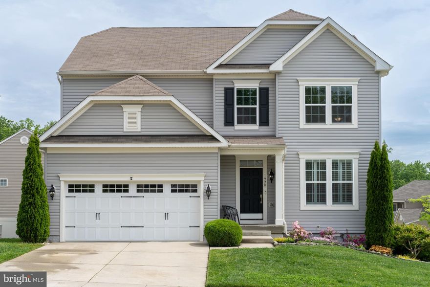 Step into this  model-like  5-bedroom colonial home located in Cromwell Ridge! Built in 2016, this home showcases modern elegance and functionality – ideal for comfortable living and entertaining.  The main level boasts an inviting open concept layout featuring engineered hardwood flooring, an eat-in kitchen with all the modern updates including an island with breakfast bar, a spacious family room and additional sitting/living room – offering ample space for gatherings and everyday living.   A powder room and private office on the main level also adds convenience and flexibility to the space.   Upstairs, discover the primary bedroom featuring two walk-in closets with custom closet organization systems and an en-suite bathroom boasting dual sinks, shower and separate toilet area for added privacy.   Three additional bedrooms, another full bath, a loft area and a laundry room complete the upper level.  The fully finished walk-out lower level adds versatility, offering extra living space with luxury vinyl plank flooring, a convenient kitchenette, an additional bedroom, a full bathroom, spacious family room area, storage room and a slider to a stone patio.   Step outside to enjoy the beautifully landscaped yard with irrigation system, fully-fenced backyard, and maintenance free deck & stone patio -- creating the perfect outdoor oasis for entertaining or relaxing.   Conveniently located just minutes from 695 with easy access to an array of restaurants & shopping destinations.