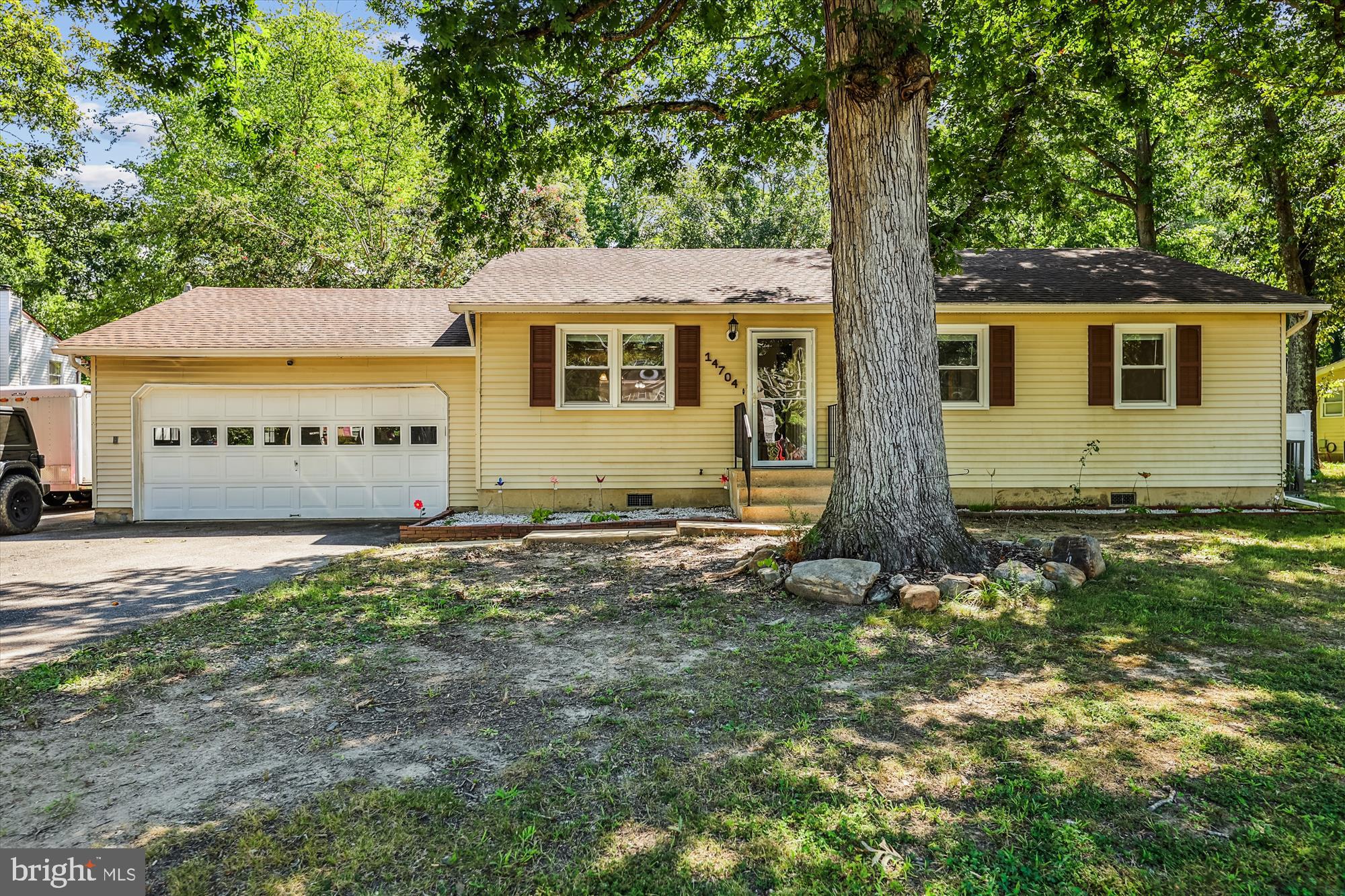 Large spacious rambler with many upgrades! Freshly painted, vinyl front fences w/fully fenced yard, heat pump 2025, roof 6 year young, laminate flooring, and large primary bath! Upgraded kitchen, one bedroom is separate for great use as a guest room or office. Large parking area for all your needs (RV or boat? bring them), oversized 2 car garage, and deck to enjoy your spacious outdoor space. Great Location, location, location on getting to DC, VA, or other parts of MD.