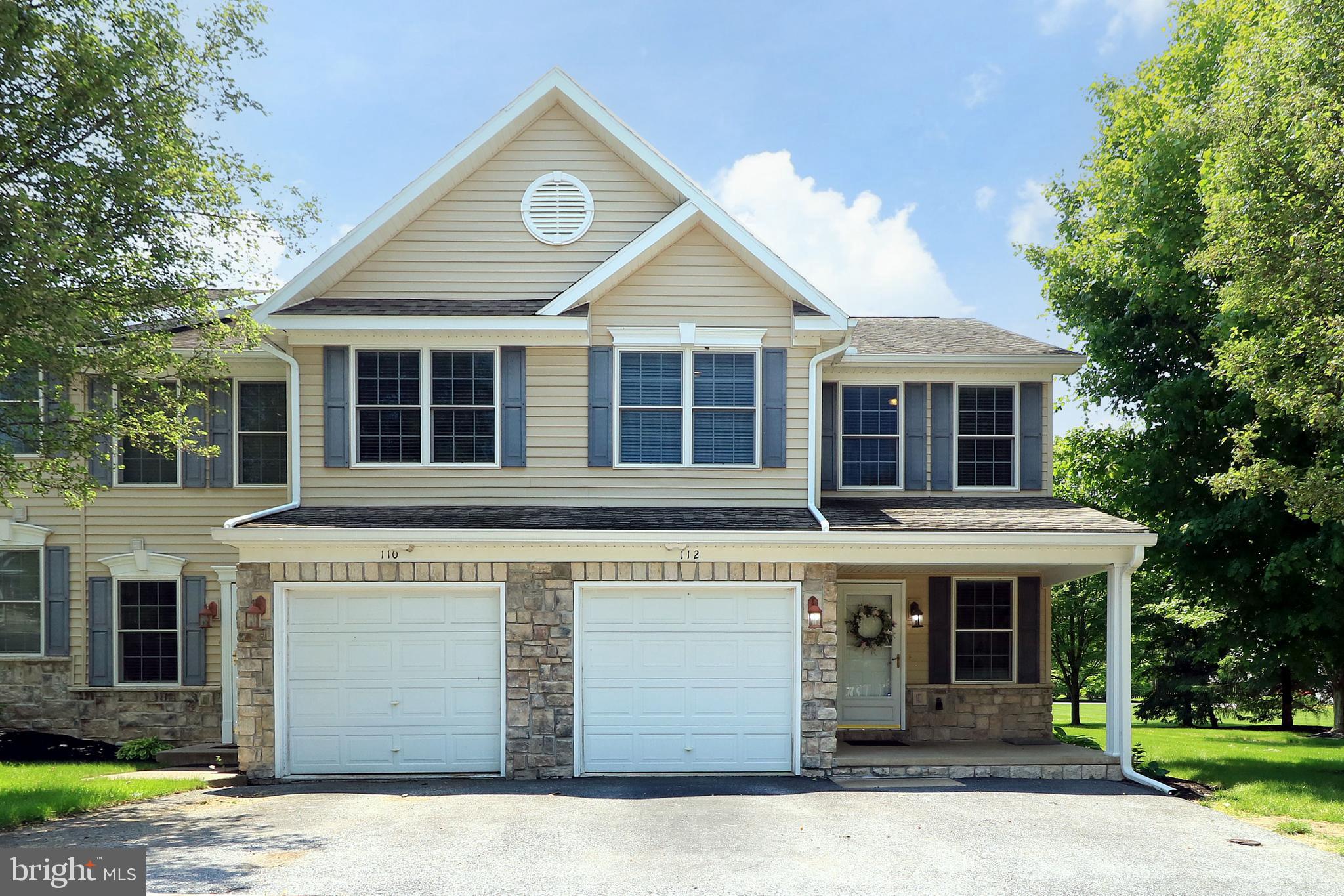 Maintenance-Free Living in a Resort-Like Setting. Welcome to Townhomes at Independence Place, the perfect home base for those with a busy lifestyle seeking comfort, convenience & community. This move-in ready end-unit townhome offers low-maintenance living in a beautifully maintained neighborhood with resort-style amenities. Boasting a prime location with easy access to I-99, Route 322, shopping & restaurants, everything you need is right at your fingertips. You’ll love the inviting covered front porch & eye-catching curb appeal. Step inside to a sun-drenched interior featuring stylish paint selections, chic lighting fixtures & gleaming hardwood floors. The bright & airy living room flows seamlessly into the dining area & fantastic kitchen, complete with Corian solid surface countertops, solid wood cabinetry, a glass tile backsplash, ceramic tile flooring, pantry, included stainless appliances & a center island with storage and a sleek modern black linear light fixture. A sliding glass door leads to the rear deck, where you can relax & enjoy views of the tree-lined backyard. Upstairs, you’ll find a serene primary suite with a private full bath featuring a dual vanity, ceramic tile flooring & a generous walk-in closet. Two additional bedrooms, another full bath, plus a convenient second-floor laundry room complete the upper level. The finished basement provides additional living space with a large rec room featuring engineered hardwood flooring, perfect for game days or movie nights, as well as a utility room & 2 spacious closets for storage. Additional highlights include a handy main floor half bath, natural gas forced air heat, central A/C & an attached 1-car garage. Residents of Independence Place enjoy a community rich in amenities, including an in-ground pool, clubhouse, playground, tennis/basketball courts & scenic trails. The monthly condo fee covers lawn care, snow removal, refuse, exterior maintenance/insurance & guest parking, allowing you to focus on what matters most. Whether you're looking for full-time living or a Happy Valley weekend retreat, this home is the definition of carefree living.