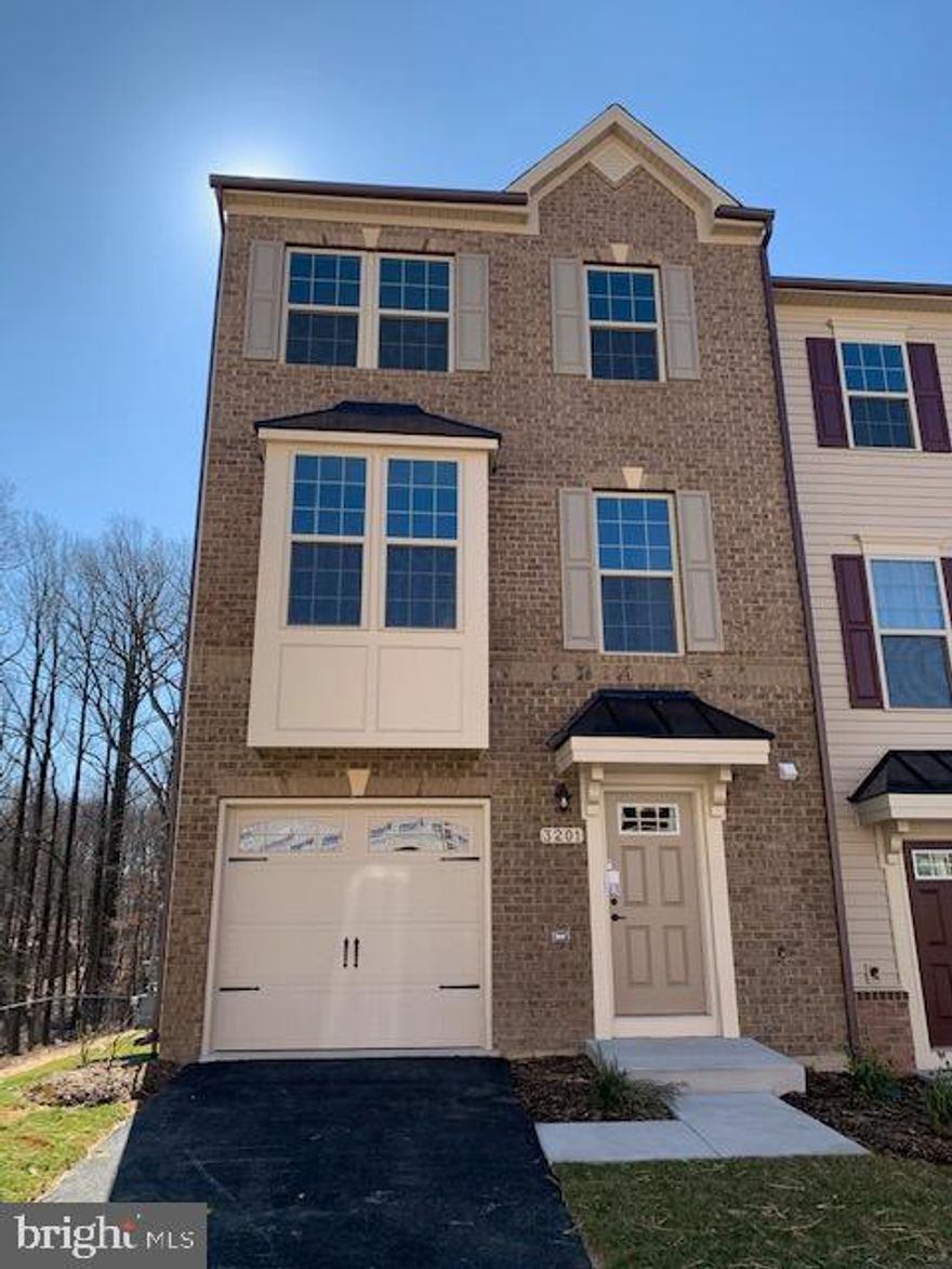 Beautifully designed end unit with 3 level town home, 3 bed rooms, 2.5 baths & 1 car garage fresh paint. Enjoy your back to wood view  during all seasons  from the deck or even from your master bedroom via window. Kitchen boasts large granite island with built-in sink, white cabinetry & hub  for mini workstation, all stainless appliances, daylight bright filled all levels. Hardwood floor through out main living floor and stairs. Master bed room includes ceramic bath, glass shower, dual vanities. Laundry located on bedroom level. Just a cup of coffee in the morning for beginning a fresh energy day or favorite drinks in the evening and Jazz music enjoy romantic wood viewing  after the sunset! The back yard is yours !! DON'T MISS!!