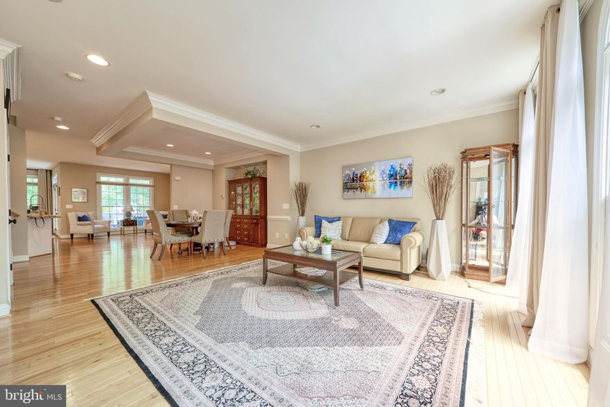 SUBMIT YOUR OFFERS! AVAILABLE TO TOUR! Beautiful 3 bed, 4.5 bath, all-brick home that's flooded with NATURAL LIGHTS with it's tall ceilings, expanded windows, skylights, and open floor design layout. Not your normal townhouse, this one comes with a 3-level BUMP OUT upgrade which gives you a bright sun room by the kitchen, sun room in the master bedroom, and extra office space in the finished basement. Gourmet eat-in kitchen features modern STAINLESS STEEL appliances, GRANITE counter tops, WHITE LUXURY CABINETS. Spacious master bed with vaulted ceilings, walk in closet, and a beautiful bathroom with double vanity and a seperate bath/shower. Contemporary floor to ceiling tiles in the master bath. Every bedroom on the 2nd level have it's own PRIVATE BATHROOM. Two gas fire places- one on main level and another in the cozy basement.  HARDWOOD floors on the entire first and 2nd level. Prestigious OAKTON HIGH school pyramid. 2 Car garage with space for another 2 cars on the driveway. 1.5 miles to metro & 0.5 miles to Rt 66. Walk to shops and restaurants. Rear fenced. NEWER HVAC 2016, Roof tune up and inspected 2020, Kitchen back splash 2016, Built in microwave 2016, Refrigerator 2018, water heater depressurizer tank 2017, gutter screens 2017, garage door spring and service 2017, etc!