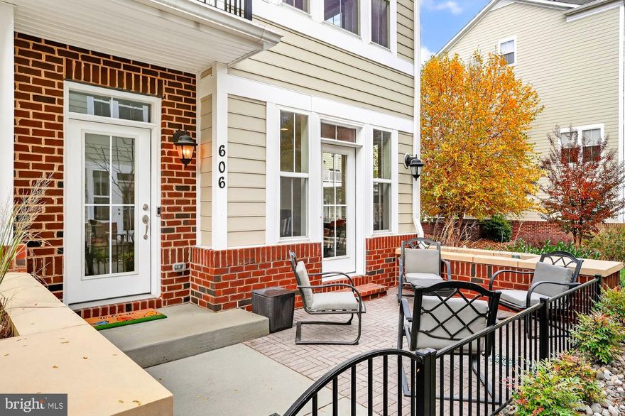 Existing / Assumable-VA Loan at a favorable 2.5% interest rate!
Welcome to Annapolis Townes at Neal Farm — where luxury living meets everyday convenience. This stunning 4-level 2019-built end-unit townhome, owned and impeccably maintained by the original owner, offers one of the most desirable locations in the community, backing to the serene, park-like green space for added privacy and views. Featuring 3 spacious bedrooms, 3 full baths, and 2 half baths, this home blends thoughtful upgrades with effortless style across every floor.
The entry level includes a flexible room ideal for a home office, fitness space, or den, along with a convenient half bath and access to the oversized two-car garage—complete with ceiling-mounted storage racks, keeping seasonal or bulky items neatly tucked away and out of sight.
Upstairs, the main living level is an entertainer’s dream, centered around a spectacular oversized granite island that anchors the gourmet kitchen. Custom cabinetry, gas cooking, and generous prep and storage space make it perfect for casual gatherings or culinary ambitions. The adjoining dining and living areas flow seamlessly, with a gas fireplace framed by custom built-in cabinetry and shelving on both sides for a high-end designer finish. Step outside to the spacious second-level deck, ideal for morning coffee or evening cocktails.
The bedroom level features two suites, including a luxurious primary suite with a custom-designed walk-in closet system for superior organization. Laundry is conveniently located on this level.
The top floor offers the perfect guest retreat or private escape, complete with an additional bedroom, full bath, and a large rooftop deck with ample room for lounge seating and sunset views over the community.
Additional highlights include dual-zone HVAC, multiple outdoor living spaces, and plentiful natural light from the end-unit configuration.
Just steps from Annapolis Towne Centre, shopping, dining, Whole Foods, fitness studios, and commuter routes to D.C., Baltimore, and BWI, this home delivers not just a residence—but a lifestyle.
End-unit. Park views. Designer upgrades. Prime Annapolis location. Don’t wait—this one checks every box.