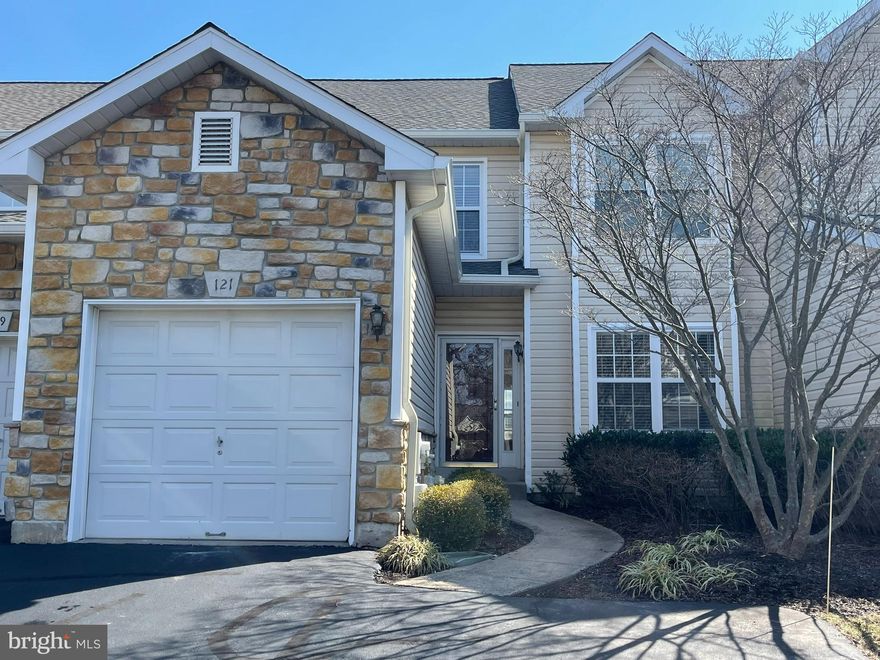 Don’t miss this opportunity to embrace easy living in this beautiful townhome in Blue Bell Country Club! Surrounded by beautifully maintained grounds, this sun-filled townhouse boasts 3 bedrooms, 2.1 baths, and a generous 1,976 sq.ft. of living space plus a finished basement. Hardwood floors flow seamlessly throughout the first floor. The kitchen has been tastefully updated in recent years. Cherry cabinets, a white subway tile backsplash, stainless steel appliances, and granite countertops create a gourmet haven that will inspire your inner chef. The kitchen effortlessly opens to a cozy family room adorned with a gas fireplace, creating a warm and inviting atmosphere. Sliders from the kitchen lead to a spacious deck for outdoor entertaining or simply enjoying a morning coffee with a view. Venture upstairs to the expansive primary suite, complete with a luxurious primary bath and a sizable walk-in closet. Two additional well-appointed bedrooms share a hall bath, providing comfort and convenience for family and guests. The convenience continues with an upper-level laundry area, making household chores a breeze. The fully finished basement provides additional living space that can be tailored to your specific needs. A one-car garage adds a touch of practicality to this already impressive home. This gated community offers a plethora of amenities, including exterior and lawn maintenance, snow and trash removal, and access to a clubhouse. Immerse yourself in the vibrant community spirit with opportunities for swimming, tennis, pickleball and basketball, and a new tot lot. Golf and a health club are perks offered for an additional fee for those seeking an active lifestyle. Conveniently situated near major thoroughfares such as 202, 309, 476, and 76, while commuting is a breeze with public transportation. Excellent restaurants, entertainment and shopping are at your fingertips, all within the highly rated Wissahickon School District. Make this home your new reality!