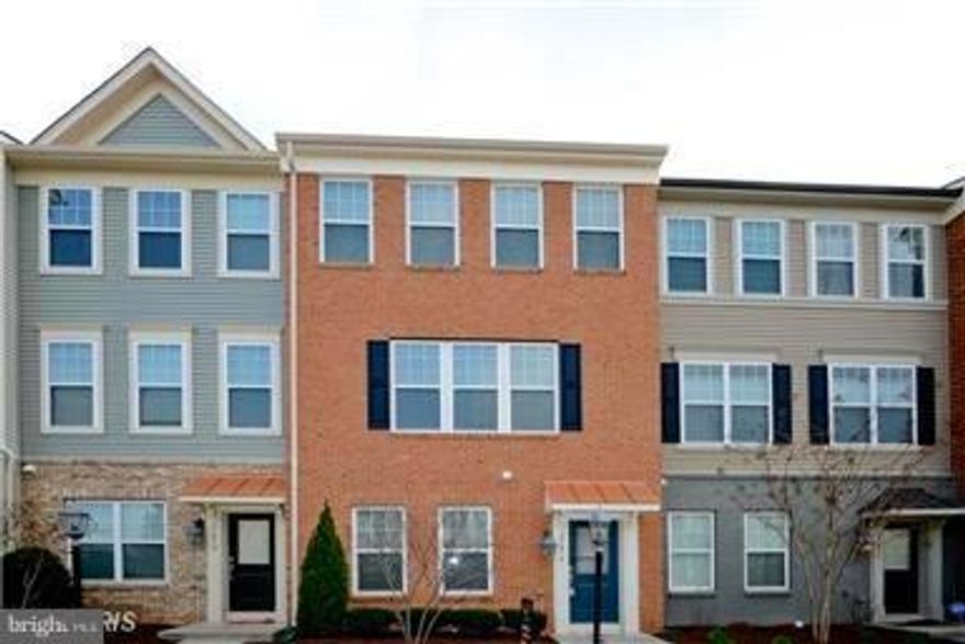 The Claremont model well maintained town house in East Gate One! Beautiful brick front,2 car garage,gleaming wood floor in  basement and main level,SS appliances with granite kitchen counter top and island and upgraded cabinets,crown moldings, Great location, easy access to major commuter roads/shopping.