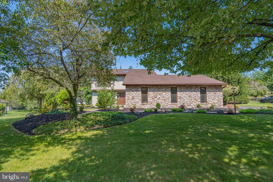 Welcome to this Contemporary home nestled in the lovely subdivision of Country Downs in East Penn School District. The unique floor plan offers a central kitchen with center island, formal living and dining rooms, a cozy family room with stone fireplace, first floor bedroom or office with full bath connected, powder room and a heated sunroom. Upstairs you will find a large master bedroom suite with walk in closet & bath with separate tub & shower. Two additional bedrooms and hall bath complete the second floor. Private back patio, flat landscaped yard with sprinkler system. A two car side entry garage and basement with bilco door for all of your things. Nicely landscaped, exterior and interior painting just completed. Conveniently located minutes to LVHN, Interstates, and shopping. See it today! Showings begin Saturday 8/5 at 1pm