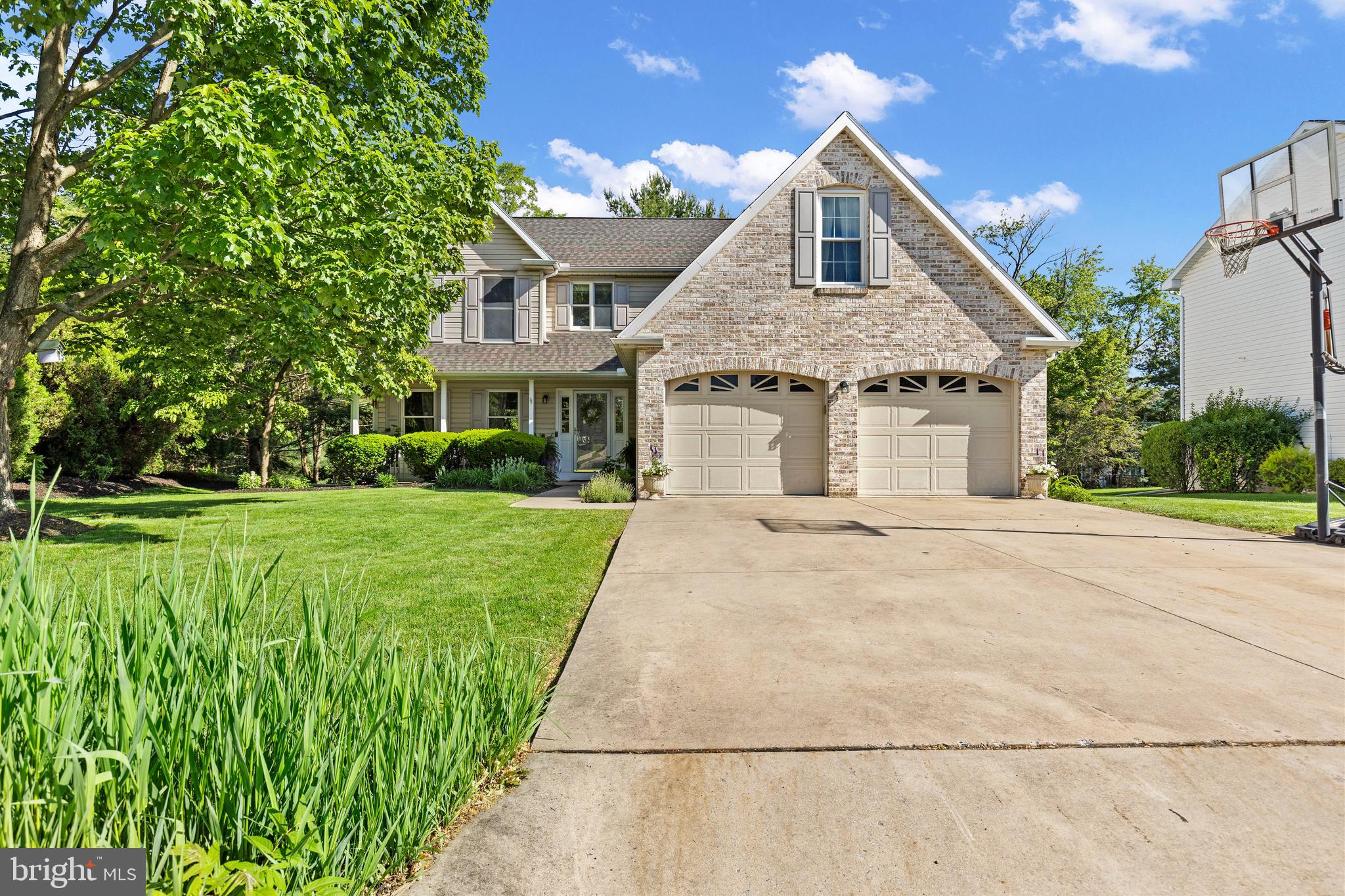 Welcome to this beautifully updated home in the sought-after Quail Hollow community, where timeless charm meets everyday comfort and thoughtful upgrades. From the classic brick exterior to the inviting front porch, this home makes a warm first impression. Inside, you’ll find beautiful hardwood floors, abundant natural light, newer windows, and scenic glimpses of the Blue Mountains from the rear windows and elevated deck. This home offers 5 bedrooms, including a spacious finished room above the garage with a large closet that works beautifully as a bonus room or guest suite. One of the main bedrooms also works wonderfully as a cozy home office, depending on your needs. Major updates include a new roof (2023), new HVAC system (2023), and a gas fireplace with new insert. The kitchen features granite countertops, gas cooking, and a central island perfect for gathering. The fully fenced backyard offers space to relax, entertain, and enjoy the outdoors, whether you're grilling on the deck or tossing a ball around with the dog. This home has been lovingly maintained and is ready for its next chapter. For added peace of mind, a one-year home warranty will be provided by the seller. Plus, its location offers easy access to a variety of nearby restaurants, grocery stores, and yes, even a quick Starbucks run just minutes away. Come experience the charm and convenience of life in Quail Hollow. Schedule your showing today!