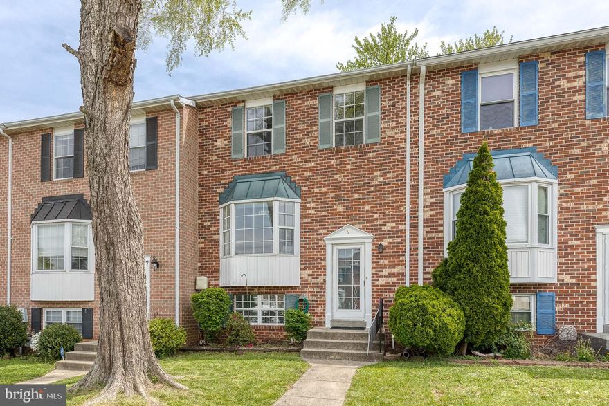 Exceptional Properties. Exceptional Clients. Welcome to this beautifully updated 4-bedroom, 2.5 bath townhome, situated in the desirable Oakhurst community of Nottingham! From the moment you enter, you will be captivated by the bright and welcoming ambiance that flows throughout the home. The main level boasts an open-concept layout enhanced by fresh neutral paint, plush new carpeting, and abundant natural light—ideal for both everyday living and entertaining. The updated kitchen, with sleek new appliances, boasts a gorgeous bay window and breakfast dining area. The spacious living room and adjacent dining room are a perfect place to relax and unwind. Step outside to the large rear deck to enjoy your morning coffee and sunshine. Upstairs, the serene primary bedroom offers a peaceful retreat with generous closet space and a full bath. Two additional well-sized bedrooms and a stylishly updated full bath provide comfort and flexibility for family, guests, or home office needs. The fully finished lower level expands your living space with a large recreation room, 4th bedroom, half bath, and stunning brick fireplace.  Walk-out access to the backyard makes this an ideal private guest suite. With all the modern updates, thoughtful design touches, and a prime location near major commuter routes including I-95, US-40, and I-695, this home combines convenience and comfort in one irresistible package. Don’t miss your chance to make this turn-key townhome your own!