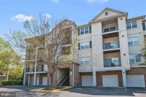 Photo of 12148 Garden Grove Circle #303, FAIRFAX, VA 22030 (MLS # VAFX2306410)