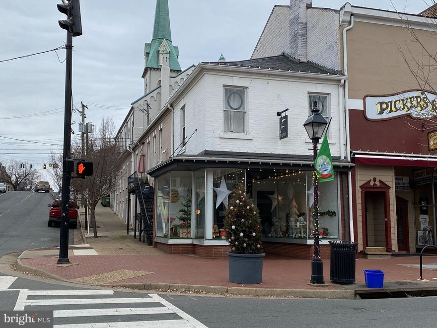 Approximately 1800 SF on the ground level in one of the key intersections of Historic Downtown Fredericksburg. Includes a 800 SF dry basement. Corner of Caroline Street and George Street across from Goolricks Pharmacy  and Soda Fountain. Just below St Georges Church . Currently Fort pure play creative childhood shop and play store. Possession is negotiable with Fort who is relocating to another location. Showing by appointment only after prequalification. Base rent $2800 ($18.67/SF), NNN. The NNN charges total $450. Total Monthly Payment is $3250.