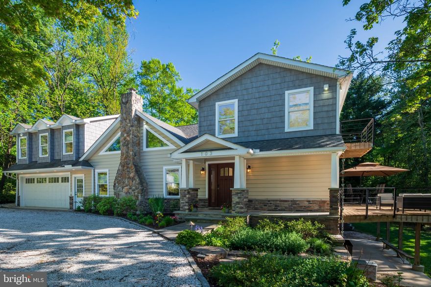 Welcome to this elegant coastal retreat, beautifully renovated in 2017 to offer comfort, sophistication, and stunning waterfront living. The expanded layout includes a spacious 2+ car garage with a rare drive-through rear door, a generously sized kitchen designed for gathering, and a large dining room anchored by a welcoming fireplace.

Step inside to a warm and inviting living room with its own fireplace and a wall of sliding glass doors that flood the space with natural light and open to a sprawling wrap-around deck—perfect for entertaining or simply soaking in the peaceful cove views.

Upstairs, a grand, sunlit loft overlooks the dining area below and connects the thoughtfully designed bedrooms. To one side, the waterside primary suite offers a serene retreat with an elegant bath and private deck. On the other side are two additional bedrooms—one with its own attached bathroom featuring a beautiful walk-in shower. Additionally there is a second full hall bath with a tub/shower combo.

The walkout basement includes a spacious workshop with wide double doors to the backyard—ideal for gardening, crafting, or home projects.

With 80 feet of private cove frontage and a dock equipped with electricity, water, and a boat lift, this home delivers an exceptional waterfront lifestyle. Simply move in and start enjoying every moment.

Bonus potential: The large loft may be converted into 4th BR plus additional den or 4th and 5th bedrooms, purchaser’s discretion and seller’s expense.  Architect schematic renderings for both options at home and in documents.