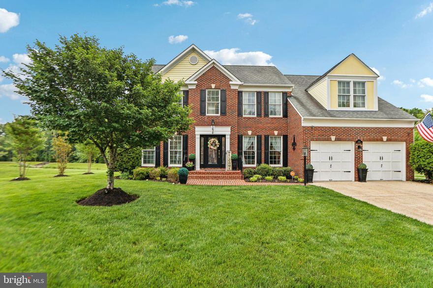 Must-see, professionally remodeled 3-level brick front Colonial in sought-after Simmons Acres with over 3,800 sq ft of beautifully updated living space. The stunning chef’s kitchen features quartz countertops, farmhouse sink with pull-down faucet, tile backsplash, island with breakfast bar, 4-burner gas range with grill, wall-mounted range hood, built-in microwave, and counter-depth refrigerator. A new sliding glass door opens to the patio, and the dramatic wrought iron staircase overlooks the sun-filled family room. The main level offers formal living and dining rooms, a private study with French doors, and soaring 16-ft ceilings with custom lighting throughout.

Upstairs, the spacious primary suite includes a walk-in closet and a luxurious modern bath with dual sinks, a freestanding tub, and floor-to-ceiling tiled shower. Wood flooring runs throughout the home, with new carpet and fresh paint adding to the move-in ready appeal.

The fully finished basement offers multiple living areas, a 5th bedroom, full bath, and storage. Recent system updates include a new HVAC unit and water-pressured sump pump. Enjoy outdoor living with a new brick front porch and walkway, freshly landscaped yard, and mature Crepe Myrtle trees. The lot backs to a pond and walking trail, with community amenities including pool, tennis, playground, and more—all within walking distance.

Conveniently located near Tanger Outlets, National Harbor, Alexandria, VA, and Washington, DC, offering easy access to shopping, dining, and entertainment options.