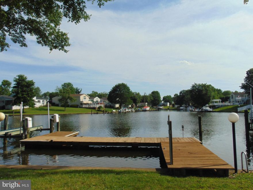 AWESOME REDUCTION--ACT NOW & Still have Time to Enjoy the Water from Home ! All Brick Rancher Exterior Features include 2-Level Trek Deck...Upper Deck 17x16 and Lower Deck 22x8...plumbed for Gas Grill overlooking Panoramic View of Gunpowder. Gazebo Concrete & Stone Patio access Pier w/Concrete Bulkhead Electric BoatLift & 6'Mean. Never be in the Dark--Peace of Mind w/Whole House Generator! Tankless HWH Central Vac operational but in need of attachments Security System & Main Level Washer/Dryer.   Interior offers Open Floor Plan 2 Sided Brick Hearth Gas FP between LR/FamRm. Int needs Updating  BUT 2,040 s/f Above Grade+Lower Level w/3rd Full Bath affords Plenty of Opportunity to Let your Imagination Run Wild! DON'T FORGET--2 Car Tandem Garage Accessible from Rear. Feel Like You're On Vacation Year Round!