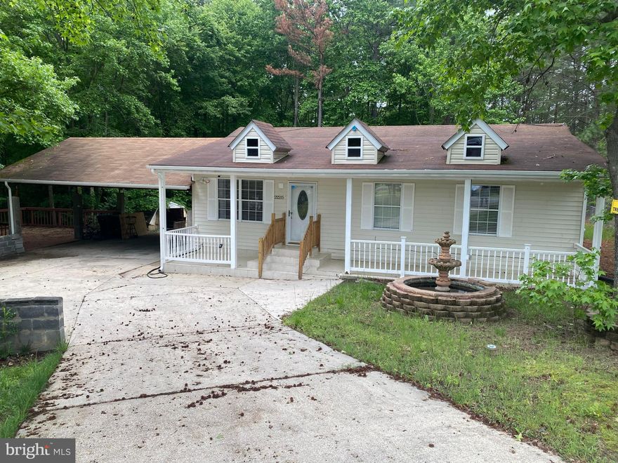 Great house in quiet neighborhood.  This home has so many possibilities, located in a cul-de-sac . Minutes from all major locations, close to Patuxent River Naval Air Station, restaurants and entertainment.  The home has 4 large bedrooms and 2 full baths and 2 half  baths.  Large eat in kitchen with ceramic tile and space for a table. Separate dining room and family room. There is a guest cottage attached to the house with a half bath . One full bathroom in the lower-level large family room. Property also has a water fountain and a storage shed.  Attached Carport and a detached garage.  Updated Florida room,  new closet doors, house  freshly painted throughout, updated lighting in basement.