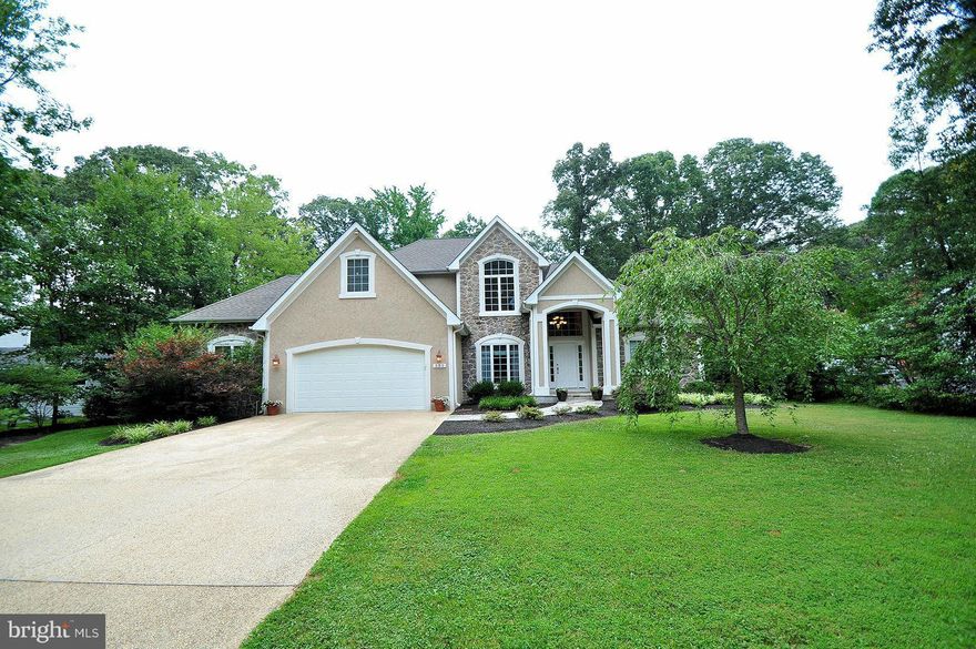 CUSTOM NEWER BUILT IN SOUGHT AFTER BERRYWOOD! GREAT AMMENITIES - 2 MARINA'S,POOL,CLUBHOUSE & MORE! PERFECT FOR THE BUYER WANTING NEW CONSTRUCTION FEEL IN AN ESTABLISHED COMMUNITY! CUSTOM KITCHEN W/ 2 SIDED FIREPLACE. FAMILY RM. W/STACKED STONE FIREPLACE. LRG SUNROOM OFF KITCHEN. RARE 1ST FLOOR MSTR. BEDRM. W/ ENSUITE. JUST A FEW OF THE MANY UPGRADES THIS HOME HAS TO OFFER! DON'T MISS THIS ONE! 10+