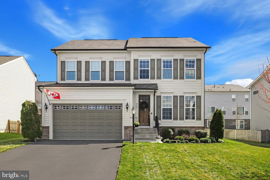 Nestled in Manassas Park, this stunning 4-bed, 3.5-bath home built in 2019 presents an inviting open layout flooded with natural light and adorned with recessed lighting throughout. The kitchen is a chef's dream, boasting stainless steel appliances, gas cooking, a large island, and a spacious pantry, seamlessly opening to a rear deck for al fresco dining and entertaining. Flowing from the kitchen, the expansive living room features a cozy gas fireplace, creating a warm ambiance. A bonus room on the main level offers versatility, ideal for a home office or guest quarters. Upstairs, four bedrooms await, including a luxurious primary suite with recessed lighting, dual walk-in closets, and a lavish bathroom featuring a large walk-in shower and dual vanities for ultimate comfort and convenience. Completing this exquisite home is a finished basement, adding valuable additional living space, perfect for recreation or relaxation. Experience modern elegance and comfort in this Manassas Park gem.