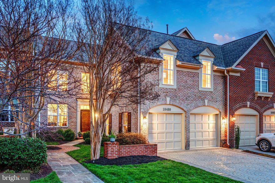 SELLERS ACCEPTED A SIGHT UNSEEN OFFER. Experience Leesburg living at its finest in this upgraded luxury townhome by Mitchell & Best, located in the prestigious River Creek gated community along the Potomac. Featuring an open floor plan with high ceilings, designer finishes, and multiple decks overlooking private outdoor spaces, this residence provides an ideal setting for both entertaining and everyday comfort. Arriving home, manicured landscaping and a charming stone and brick path lead to your formal entry and two-car garage. Inside, the main level unfolds into a bright, open-concept layout featuring high ceilings and abundant natural light. Formal living and dining areas showcase elegant crown and chair rail moldings. The family room flows into the gourmet kitchen, which features a marble island, contemporary lighting, abundant all-white cabinetry, stainless steel appliances, and a bonus pantry. Enjoy casual meals in the bay window breakfast nook or move directly onto your covered deck for outdoor dining. Upstairs, your primary suite awaits with airy tray ceilings and a generous sitting area that opens onto a private balcony. Two walk-in closets lead to a spa-inspired bath with an oversized frameless shower and white Shaker double vanities. Two additional bedrooms are located on this level, one impressively sized with cathedral ceilings, as well as an updated full bath with subway tile and the laundry room with stacked LG front-loaders conveniently nearby. The lower level expands your living space further with another large gathering area that opens onto the shaded paver patio and fully fenced backyard. A versatile fourth bedroom on this level can easily serve as an office or guest suite, and an unfinished storage room has a wet bar, sink, and full refrigerator, with additional potential to customize. Enjoy peace of mind with recent upgrades including a new roof (2022), HVAC system (2022), hot water heater (2023), and carpeting (2022), plus new LVP floors in the lower bedroom (2023). The River Creek community offers exceptional amenities: over 600 acres of dedicated open space, seven miles of private trails for walking or biking, picnic areas, Potomac River access with canoe/kayak storage facilities, championship golf course designed by Ault Clark, tennis courts, basketball courts, swimming pools, plus a clubhouse featuring dining options and fitness center. Situated approximately 25 miles from Washington D.C., you're minutes from downtown Leesburg's vibrant restaurants and shops, major commuter routes, Ashburn Metro Station, Dulles Airport, wineries, breweries, farm markets, Wegmans, Whole Foods, One Loudoun Town Center, Leesburg Corner Premium Outlets, Village at Leesburg, and Leesburg Plaza shopping centers. Here is your opportunity to own a beautifully renovated townhome in one of the area’s most sought-after neighborhoods. Welcome home!