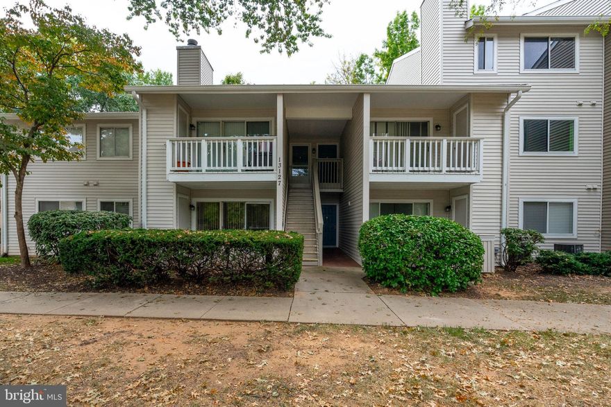 LIKE A BRAND NEW HOME! Move-in Ready!! Welcome home to this recently and fully renovated cozy 2Bed-2Bath corner unit with a wood-burning fireplace. All new flooring  and lights throughout the home. Updated kitchen and bathrooms, new appliances (refrigerator, dishwasher, and washer/dryer), and freshly painted throughout.  New HVAC and water heater. Enjoy your own private outdoor patio with a great view. The unit has great closet space, including a large walk-in closet in the master bedroom. Plenty of natural light in this home. Close to community amenities, including swimming pool, recreation center/clubhouse, basketball court, and more. Convenient to shopping, schools, recreation, I-270 and I-495! Seller offering 1-year warranty through AHS. The unit (physically labeled as #1) is in the courtyard of the clubhouse and pool and faces both. Park in space 74.