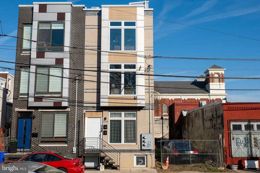 Welcome to a spacious bi-level condo designed for modern city living. Built in 2019, this home offers 3 bedrooms, 3 full bathrooms, and a private fenced patio perfect for outdoor entertaining or everyday use. The layout provides separation between living and sleeping areas, making it ideal for an owner-occupant seeking privacy or a buyer looking to offset their mortgage with roommates. Located just off the Ridge Avenue corridor in the Francisville/Fairmount area, this home is a short bike ride to the Philadelphia Art Museum and the Schuylkill River Trail, with convenient access to Temple University, the Broad Street subway line, and nearby restaurants and cafes. Interior features include wide plank flooring, recessed LED lighting, and a modern kitchen with stainless steel appliances, slow-close cabinetry, white subway tile backsplash, and granite countertops. All three full bathrooms are finished with contemporary tile and fixtures, including rain shower heads. In-unit washer and dryer. Full 10-year tax abatement issued in 2018 with approximately two years remaining, offering a significant advantage on monthly ownership costs now and strong long-term rental potential.