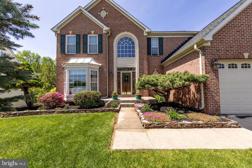 COMING SOON! Welcome to 9621 Gerst Road in the heart of Perry Hall — a stunning brick front colonial lovingly maintained by its original owners. This spacious 4-bedroom, 3.5-bath home offers timeless charm and thoughtful upgrades throughout.

Step inside to a grand two-story foyer featuring a gorgeous curved staircase. The main level is designed for both comfort and style, with a combination of tile and carpet flooring, a cozy family room with a gas fireplace, and a bright bay window that fills the living space with natural light. The updated windows on the main level bring in even more sunshine while offering energy efficiency.

The heart of the home is the gourmet kitchen, featuring a large island, stainless steel appliances, granite countertops, a walk-in pantry, and a sunroom extension that's perfect for casual dining or relaxing with morning coffee. Main level laundry adds everyday convenience!

Upstairs, the primary suite is a true retreat with a luxurious spa bathroom — the perfect place to unwind after a long day. Three additional spacious bedrooms and two full baths complete the upper level.

The fully finished, walk-out lower level provides endless possibilities — ideal for a rec room, home gym, or guest suite — with plenty of natural light pouring in.

Outside, enjoy a fully fenced backyard that backs to peaceful trees, a custom-built storage shed under the deck, and a spacious deck perfect for entertaining or simply soaking in the view. The 2-car attached garage and extra-wide driveway provide plenty of parking space.

Major updates include a brand new hot water heater, a roof that’s only two years old, and a seller credit for carpet replacement so you can personalize the space to your liking.

Homes like this don’t come around often — don’t miss your chance to make this one yours!