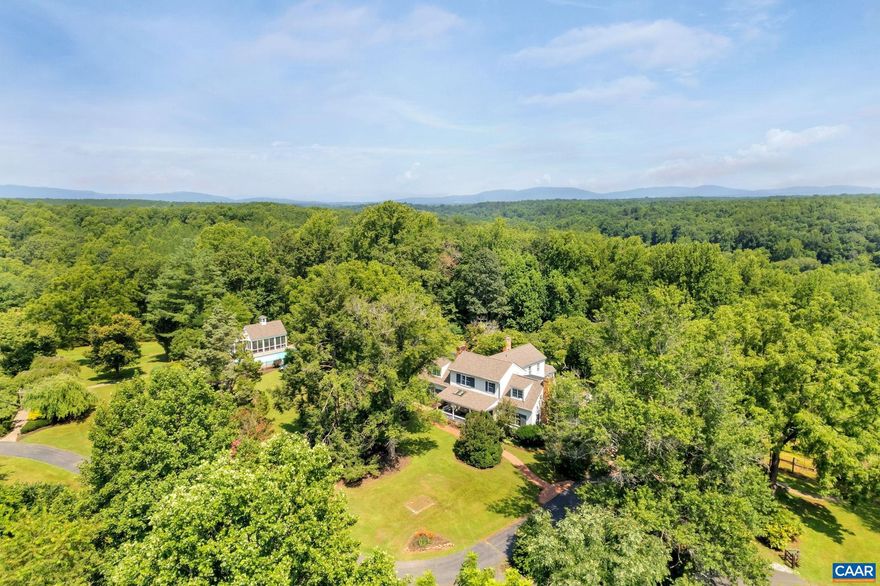 Whippoorwill Hill // Extraordinary offering on 196 acres only 14 miles from Downtown Charlottesville. Pastoral and wooded setting with lengthy Rivanna River frontage plus a secluded, stocked pond. Enjoy country living (with or without livestock) in Palmyra, minutes from Lake Monticello's shopping and amenities. The original farm house Circa 1858 has been renovated and expanded to (now) include 6 bedrooms, 6.5 baths, 2 kitchens, multiple living areas (gracious as well as informal), terrace level apartment plus outdoor spaces perfect for relaxation and entertaining. You?ll love the pool with retractable cover, the screened pool pavilion, outdoor shower, and hot tub/spa.  Take the Polaris Ranger to the River, one of the dependencies or to work in the garden, wood shed or tinker with farm projects. A quick trip down to the riverbank allows for good old fashioned fun. Hiking trails throughout are marked for adventure and exercise.  The possibilities at Whippoorwill Hill are endless: family compound, vacation property, working farm, or natural retreat. Development and Conservation Easement opportunities available. List of Equipment (included) attached.  Shown by Appointment.  Come see what all the fuss is about!