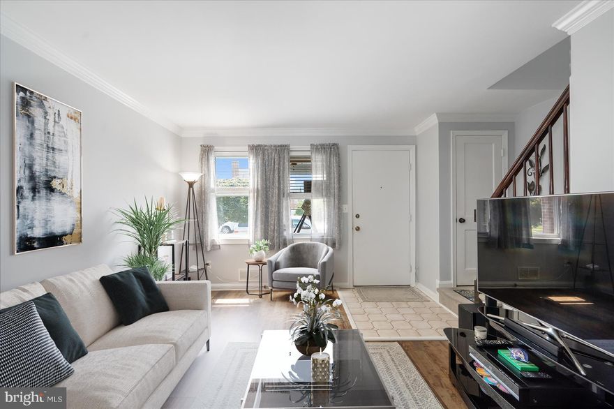 Welcome home to this beautiful 3 Bedroom, 1.5 Bathroom Home Located In  Eastwood. (Baltimore County)Be Greeted by the beautiful screened in front porch and enter this charming home. When you walk in, you'll immediately feel the warm natural light cascading throughout the home. The main level offers a living room, dining room/kitchen combination complete with a gas stove, built-in microwave, refrigerator, and ample white cabinetry. The main level offers an additional bright filled sunroom complete with a hot tub- perfect stop for entertainment! The upper level includes 2 spacious bedrooms with ample closet space complete with a full bathroom. The lower level has a large finished basement with a third bedroom with storage, a half bathroom & a laundry room.  Bonus features include 2 car private parking pad!