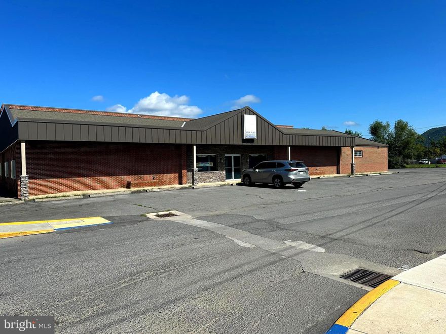 This building was completely remodeled in 2010.  This included 4 new Zoned HVAC systems.  So much potential within these walls.  Your dreams and goals are the limits.  OVER 17,000 sq ft of income producing space to make your dreams come true.  Approximately 40 PARKING SPACES with a loading dock available.  Remarkable location in the heart of town with road frontage on 2 sides of the building.  Excellent opportunity for office space, medical facility, daycare, retail or an indoor community arena.  Two floors with outdoor access to both levels would provide for a multi tenant opportunity.