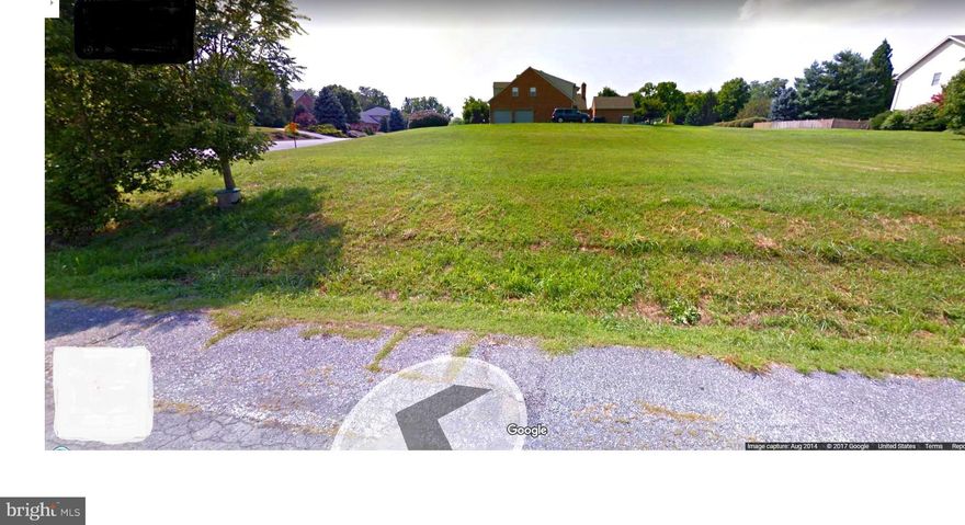 Excellent corner lot to build your dream home at the intersection of Mahogany drive and Teakwood drive Surrounded by beautiful spacious homes in sought-after neighborhood. East-facing,gently sloping; almost half an acre property; awaits your glorious sun-filled home upon it. Ideally located across from the Black Rock Golf Course and the county park.