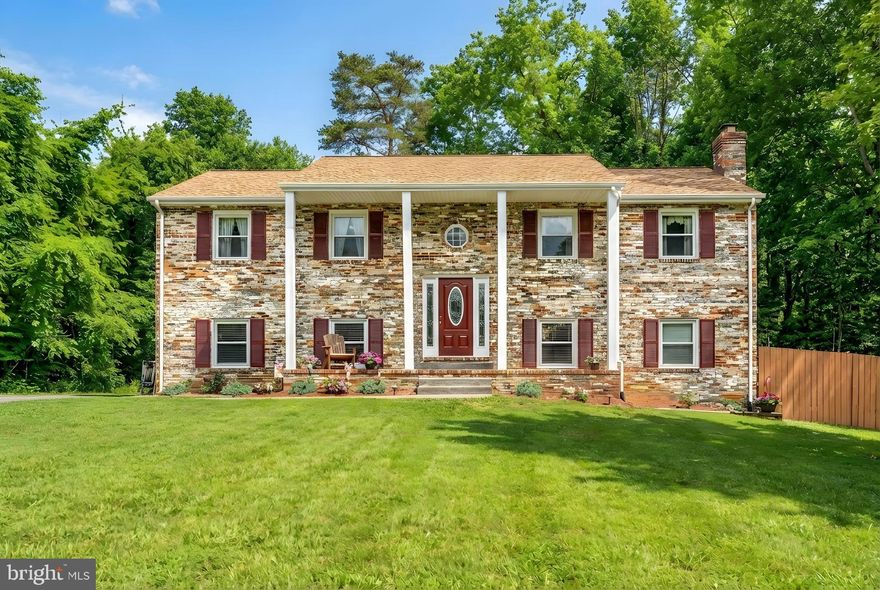 Welcome to this charming Colonial-style split foyer home featuring classic brick and column curb appeal. Inside, you’ll find an upgraded kitchen with newly installed vinyl flooring, plus brand new carpet throughout both upper and lower living areas. The lower level includes a spacious second living room complete with a wet bar—perfect for entertaining.

Situated on a 1.1-acre lot within St. Georges Estates, this property is not part of an HOA, offering flexibility and privacy. Enjoy a large fenced-in backyard with an above-ground pool and plenty of space to host gatherings. A 12’ x 16’ workshop with full electric (county-permitted) provides the ideal setup for hobbies, projects, or storage.

Conveniently located just off Route 610 and minutes from I-95, shopping, restaurants, and daily conveniences, this home combines comfort, location, and lifestyle. Don’t miss it!