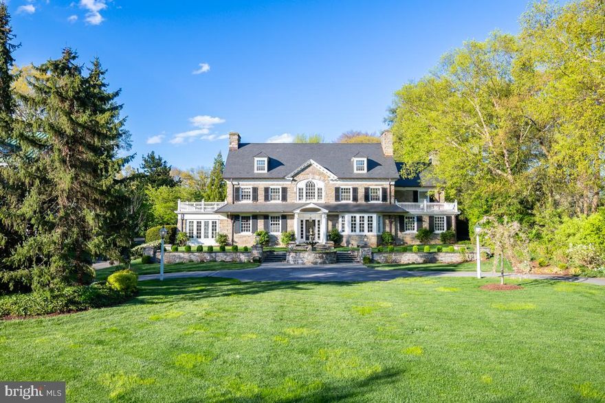 Welcome to prestigious Leigh P. Helm Mansion located on a one-acre lot in one of Lancaster’s most well-known, historic, and picturesque neighborhoods, School Lane Hills. You will appreciate this timeless and sophisticated property highlighted by world class architecture and elegant designs. Open archways, custom trims, crown molding, elegant chandeliers, deep windowsills, and intricate gold hardware all add to an immaculate design. The home boasts six bedrooms, five full and three half baths, over 7,700 square feet of living space, as well as five fireplaces and two walk-in cedar closets. This Colonial Revival Mansion was built in 1931 and designed by local architect Melvern R. Evans of Lancaster. As you walk through the front door and into the elegant foyer, you will be enchanted by views of the grand staircase. Off the foyer is an oversized living room complete with hardwood floors and gas fireplace. A bright and relaxing sunroom shines with an exposed stone wall, heated marble flooring, and patio access. An archway leads to the pleasant wine bar that includes cabinet space, a wine fridge, and a sink and is conveniently located in between the gourmet kitchen and formal dining room. The stunning and popular chef’s dream gourmet kitchen is a work of art by Bobby Herr Kitchen with an oversized 11-foot center island, granite countertops, and breakfast bar. Surrounding the island is a plethora of custom cabinets and counterspace, plus top of the line appliances including a six-burner gas range with vent, two dishwashers, a warming drawer, two refrigerator drawers, and built-in desk. Also highlighting the kitchen and a place everyone will want to congregate is the breakfast area with a lovely gas fireplace that overlooks the eye-catching patio. For more formal occasions, the oversized dining room is perfect and features hardwood floors, built-in display cabinets, and views of the gorgeous front lawn. A first-floor office is spectacular with its own gas fireplace, built-in shelves, and makes working from home a delight. Also on the main level are two powder rooms, a mudroom, and two staircases that lead to the second floor. The grand staircase in the foyer leads up to a spacious loft that can be used as a study. The second-floor hosts four bedrooms and four full baths and is home to the fabulous owner’s suite. A set of French doors lead into the owner’s suite sitting room that dazzles with hardwood floors, built-in storage, and views of the front lawn. The owner’s bath is elegant with dual vanities, walk-in stall shower, and a tub. The next staircase leads up to the third level containing a loft area with built ins, another bedroom, a large bonus room that could also be a bedroom, and a full bath. The finished lower level is lovely with a large rec room that could be set up as a game room, home theater or gym, a powder room, bonus rooms, and the spectacular temperature-controlled wine room with 2,000 bottle capacity. The exterior is phenomenal with an expansive front lawn and a fountain gracing the home. The back yard features open PA bluestone patios, a pergola, fountain, and fire pit. A detached three-car garage allows for parking and extra storage. You could even possibly convert the garage into a wonderful Carriage House with parking on the ground floor and quiet living quarters on the upper floor, ideal for guests or family staying over. The mansion with slate roof sits back on the lot with private gated entrance down a long lane. Outstanding location, close to dining, shopping, and entertainment. A short commute to Downtown Lancaster, Lancaster Country Day School, Franklin & Marshall College, as well as Buchanan Park. Schedule a showing of this special home today!