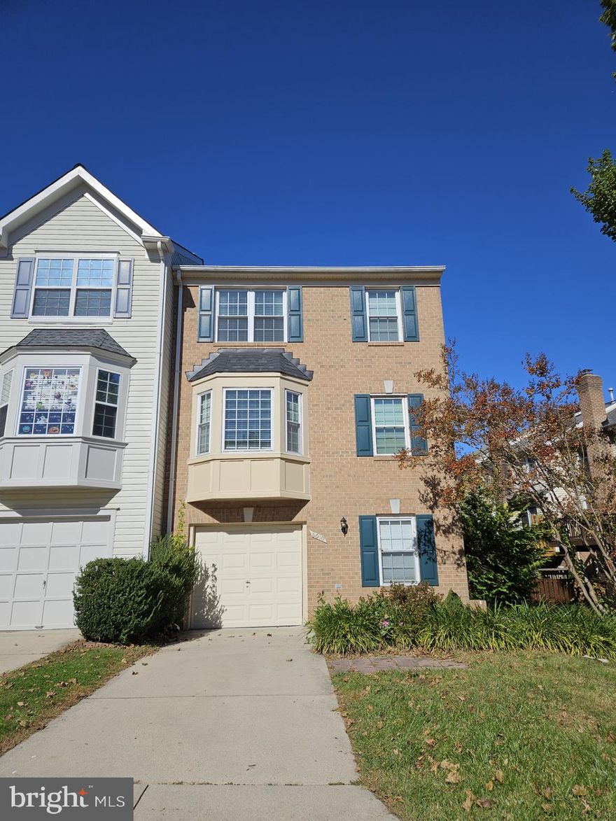 Welcome to Kingstowne a commuter's paradise! This stunning brick end-unit townhouse includes a one-car garage and boasts three bedrooms, two full baths and two half baths. Step into a spacious living room featuring hardwood floors, leading to a gourmet kitchen! The fully finished basement comes complete with a cozy fireplace. Enjoy the fenced backyard which includes both a deck and a patio. Conveniently located near major commuting routes—95, 495, and 395—and close to bus stops and metro stations, this home offers a variety of dining and shopping options. Dogs are welcome with a non-refundable pet deposit.