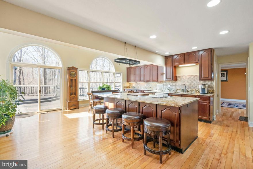 The perfect colonial in Fairfax Station. UPDATES include 2016 driveway and sealant, 2017-50 year roof installed 2019- New secondary HVAC 2020, Dual fuel generator-2021, and landscaping in 2022. Septic and Water have been serviced and deck lighting and outlets installed. 
The perfect backyard awaits. A sprawling deck that encompasses the width of your home, which slightly wraps around the side. Enjoy the quietness you are looking for.
Hardwood floors throughout the main living space grand windows and all the natural sunlight. Open kitchen vaulted ceilings with access to your back deck. Cabinets for all of your kitchen storage and a pantry you can't beat. Make sure to check out the spice rack. The main level also includes a formal dining room, living room, playroom, and an area for your work-from-home needs. Surrounded by trees each room has its tranquil scenery and don't forget about the half bathroom. The third floor has four bedrooms and two full bathrooms. The primary suite provides a large walk-in closet and ensuite double sink bathroom, including a jacuzzi-style tub. The bottom level includes a full bathroom, laundry, and storage. Nice large workroom and walks out into your backyard. 
*All sq ft is estimated
*Photos have been digitally staged*