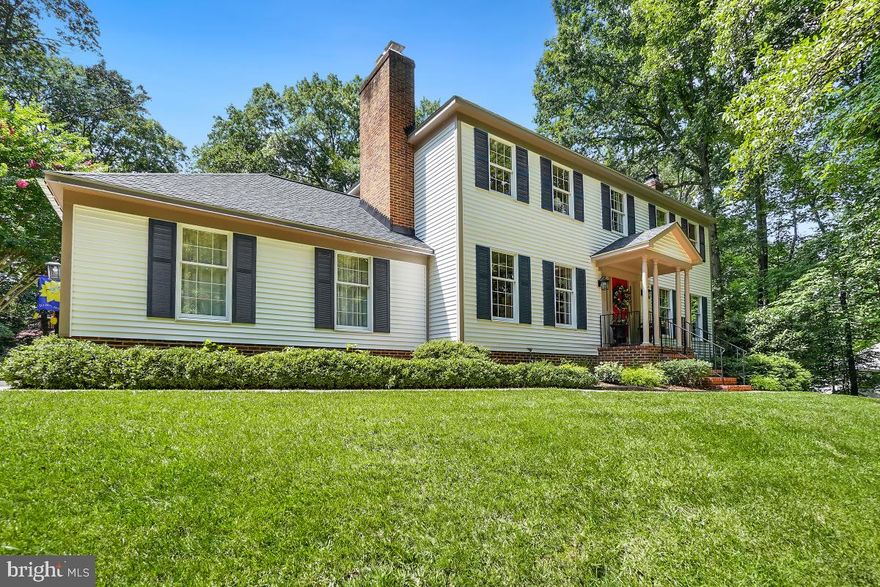 Welcome to 8142 Blandsford Drive a Stunning Brick Colonial set on a bucolic 1.6 acre lot.  Incredible, Level Backyard with Gardens and Backing to Trees.  Front Yard Professionally Landscaped in 2022.  Lovely Front Entrance into Foyer with Gleaming Hardwood Floors throughout.  Library with Fireplace and Built in Book Cases, Livingroom with Brick Fireplace with Wood Stove  This room opens to Dining Room and Screened in Porch.  Both Chimneys were inspected By Leopold and 2 new Chimney Crowns and Caps were added recently.  The Screened in Porch opens to the Deck and Patio and is ideal for summer entertaining.  Kitchen boasts new stainless Refrigerator.  Granite Topped Island is great for a buffet.  Eat in Kitchen can fit a large Table.  The kitchen also opens to the Deck.  Window overlooks the Vegetable Garden!  Laundry Room and Generous Pantry on the Main Level.  Anderson Doors open to Deck and Porch.  Wood Stairs lead to Upper Level.  Both the Primary and the Hall Baths have been remodeled.  4 Bedrooms with Ceiling Fans.  Primary Bedroom also has a Wood Burning Fireplace with Mantle and 2 Walk In Closets with 2 Closet Systems.  The Lower Level is Carpeted with a Walkout Stairs.  Owners have upgraded previous basement to current code and has permits for the basement.  Basement has a Large Rec Room, An alcove which could be for Guests or Office and a Bath, Also a Giant Storage Area.  Pool Table can Convey.  Must See this beautiful Home!  NO HOA and minutes to the VRE and Shopping.