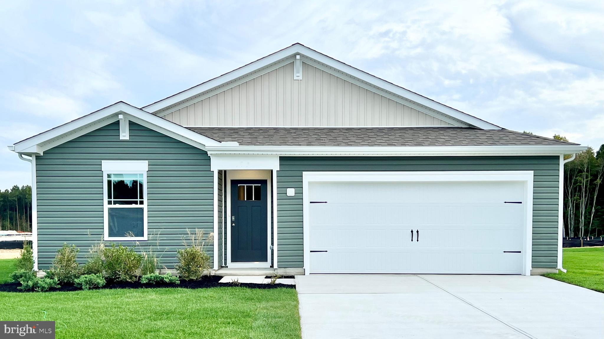 Discover 1105 Darrow Court, a new construction home in the Birdsong Village community of Salisbury, MD located on a cul-de-sac. The Boardwalk is a 1,385 square foot ranch home that offers three sizeable bedrooms, two full bathrooms and a two-car garage.
A long, welcoming foyer allows for the two guest bedrooms and guest bathroom to be separate from the main living areas. The functional kitchen has stainless steel appliances, classic white cabinets, a spacious pantry closet, and a peninsula island with granite countertops and room for additional seating. Enjoy the open concept as it allows you to entertain guests in your great room and kitchen simultaneously.
The owner's suite is set apart in the back of the home and features a walk-in closet and full bathroom with a tiled walk-in shower. The laundry room is tucked away near the entrance to the two-car garage. This home includes white window blinds, a fully sodded, landscaped, and irrigated lawn, and the exclusive Smart Home® package through ADT, giving you complete peace of mind in your new home.
Pictures, artist renderings, photographs, colors, features, and sizes are for illustration purposes only and will vary from the homes as built. Image representative of plan only and may vary as built. Images are of model home and include custom design features that may not be available in other homes. Furnishings and decorative items not included with home purchase.