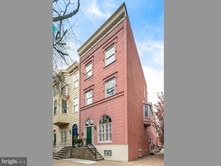 Fully renovated and rarely offered, spacious and bright CORNER 4 bedroom, 3 full and 2 half bath townhome with GARAGE PARKING in amazing Spring Garden location on sought-after Green Street. This home features high ceilings, beautiful hardwood floors on the top 3 levels, many large closets, patio, and terrace. First floor features a palladian North-facing window with custom shutters and a palladian transom over the front door, coat closet, A/V closet with in-wall connection to TV, wood burning living room fireplace, open floor plan with custom kitchen with shaker styler cabinets, glass subway tile backsplash, Quartz countertops, under-cabinet lighting, beverage refrigerator, microwave drawer, farmhouse sink, and GE Cafe Series appliances. Powder room and glass french door with pocket screens to sunny patio also on this level. Second floor features large main suite with bay window, door to terrace, customized walk-in-closet, large en-suite bathroom with double sink marble vanity, custom cabinetry, and deluxe three-piece shower with glass door. Additional bedroom and one of the two-zone HVAC closets also on this level. 3rd floor features a hall skylight, spacious bedroom with West-facing Juliet balcony, large closet, and en-suite bath with walk-in shower. Large front bedroom with 3 closets and a full bath , with skylight, off the hall next to a linen closet. Finished lower level with high ceilings includes a mudroom from underground garage parking space, powder room, finished family room/den/playroom with closet, spacious laundry/fitness room, and one of the two-zone HVAC closets. Amazing Art Museum location, two blocks from Whole Foods, close to restaurants, museums, shops, public transportation, East and West River drives and all Center City has to offer.