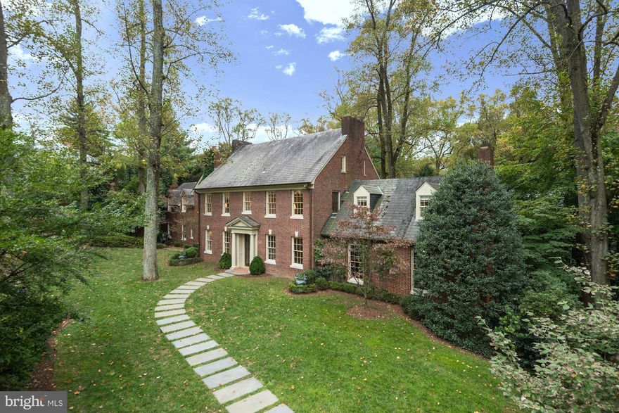 Classic American beauty! Georgian colonial sited on private 1/2-acre lot.Tastefully expanded over the years - seamless flow & modern amenities.  Main level features large living & dining rooms, stately library, gourmet kitchen & cheery breakfast room.  Stunning master suite w/ fireplace, sitting room & elegant bath. Wine cellar, terraces, lush grounds.Once in a generation opportunity.