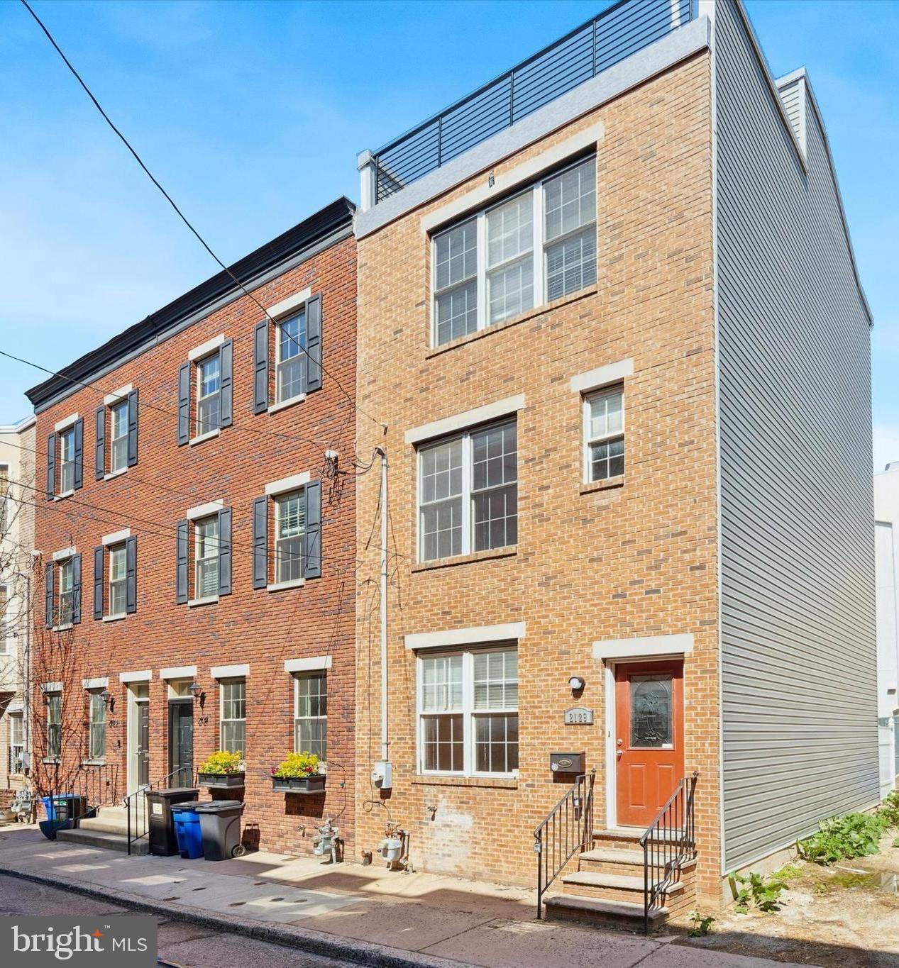 Welcome to 2129 Kimball Street! A beautifully maintained home located in the heart of Graduate Hospital, offering the perfect combination of style, comfort, and convenience for those seeking move-in ready city living. From the moment you step inside, you're greeted by hardwood floors that extend throughout the main living areas, creating a sleek and cohesive atmosphere. The open layout connects the Living / Dining space to the kitchen, making it ideal for both entertaining and every day living. The Kitchen features stainless steel appliances, ample cabinetry, and generous counter space which is perfect for cooking or hosting. Just off the Kitchen, the private rear patio offers a great space to enjoy your morning coffee or to grill. The fully finished Basement provides valuable bonus space that easily adapts to your needs, whether you're setting up a home office, gym, media room, or guest room. On the second floor, you’ll find two bright, well-sized Bedrooms, each with ceiling fans, along with a Full Hall Bathroom and a conveniently located Laundry Closet. The third floor is dedicated to the Primary Suite, complete with ample closet space, including a walk-in closet, and an en-suite Bath. From this level, you can access one of the home’s most impressive features: a brand-new roof and expansive roof deck with sweeping skyline views — the perfect setting for relaxing or entertaining under the city lights. Some recent updates include new siding, a new roof and roof deck, rear replacement windows, and fresh interior paint, making this home truly turnkey. All of this is within proximity to South Street, revitalized Washington Ave., local restaurants & cafés, parks, and public transportation. This home is a must see if you’re seeking a low-maintenance home in one of Philadelphia’s most vibrant neighborhoods.